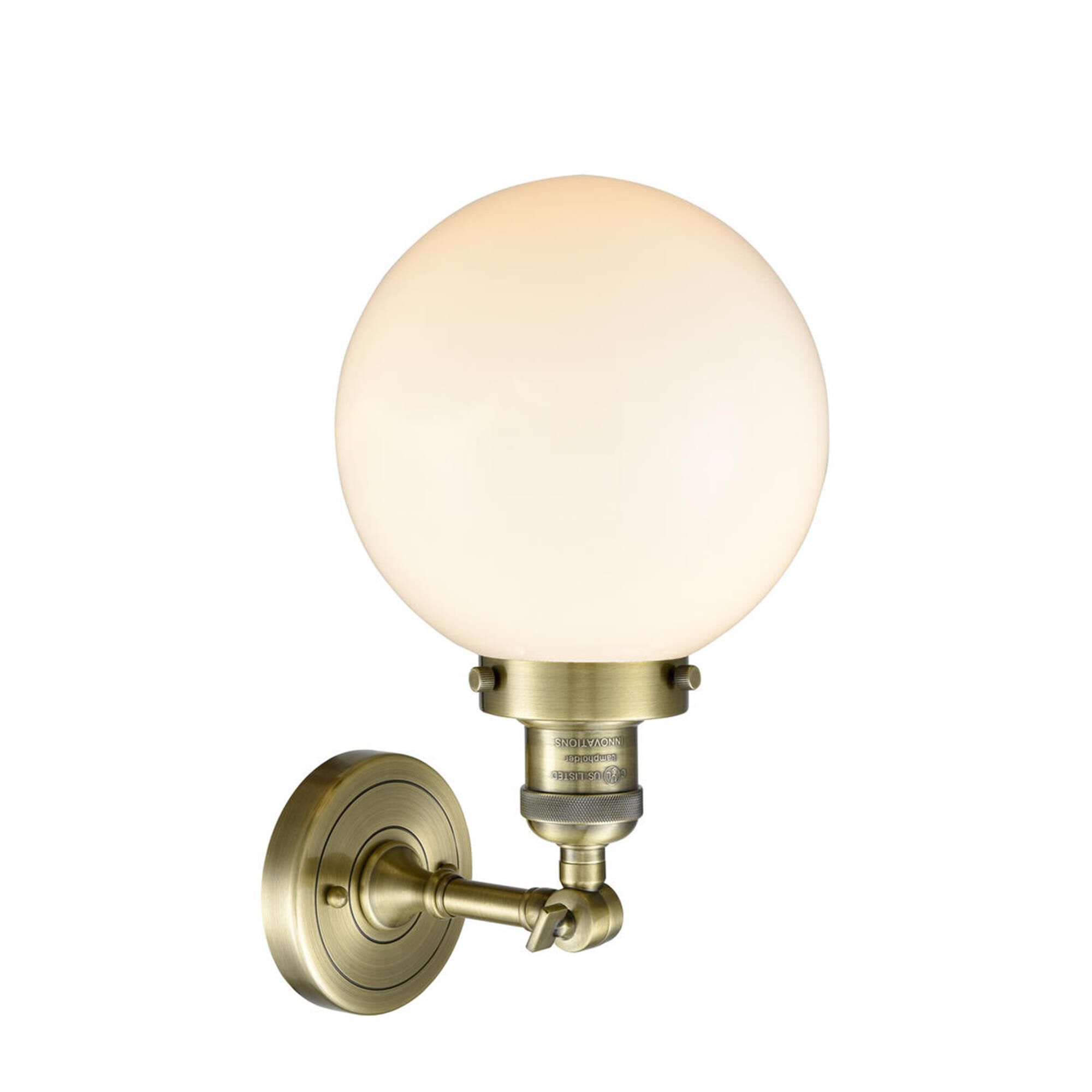 Shown in Antique Brass finish and Matte White Cased glass and No Accent accent