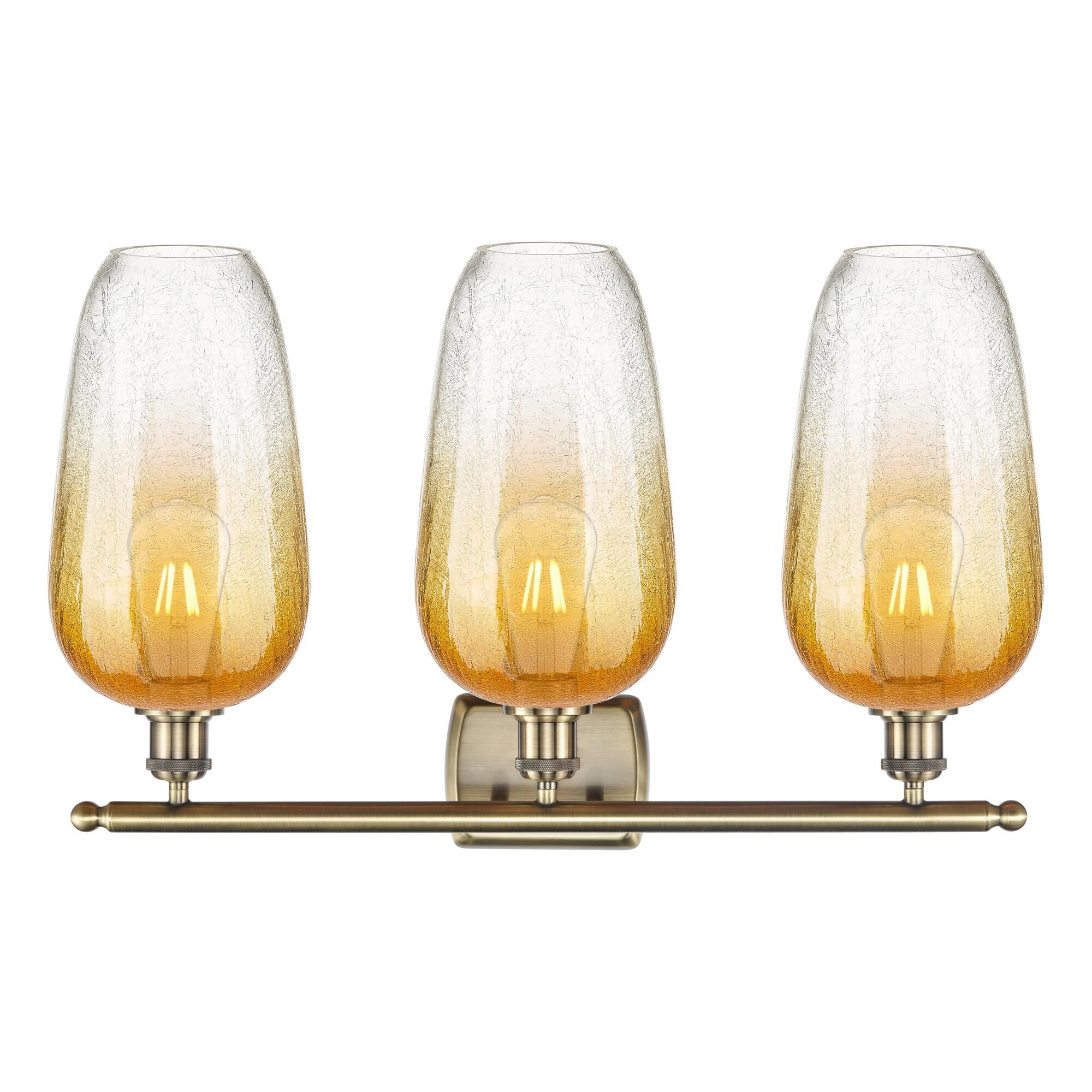 Shown in Antique Brass finish and Amber glass