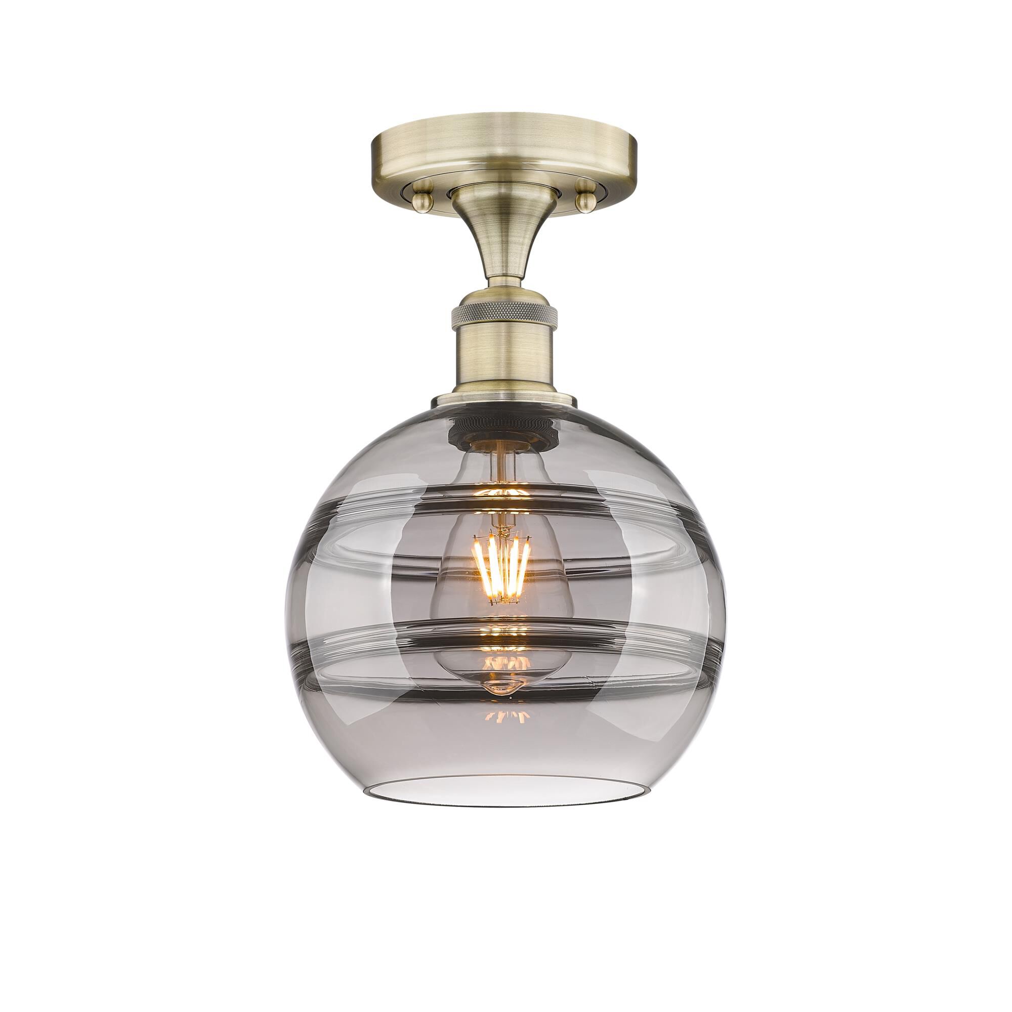 Shown in Antique Brass finish and Light Smoke glass