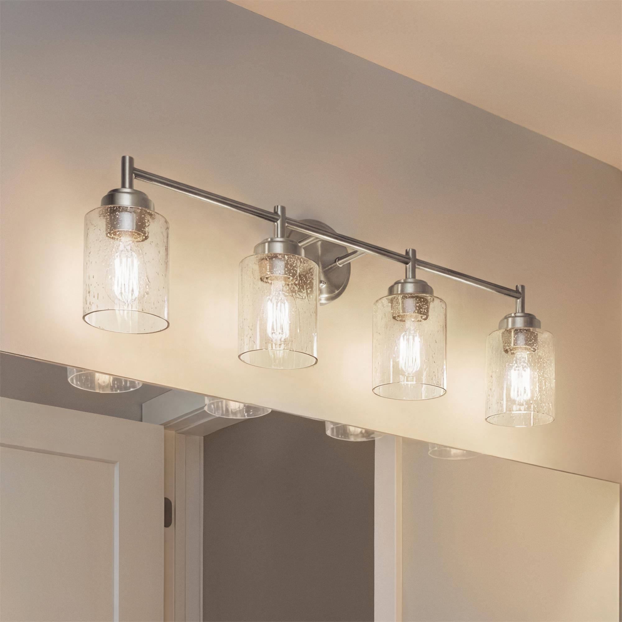 Shown in Brushed Nickel finish and Clear Seeded glass