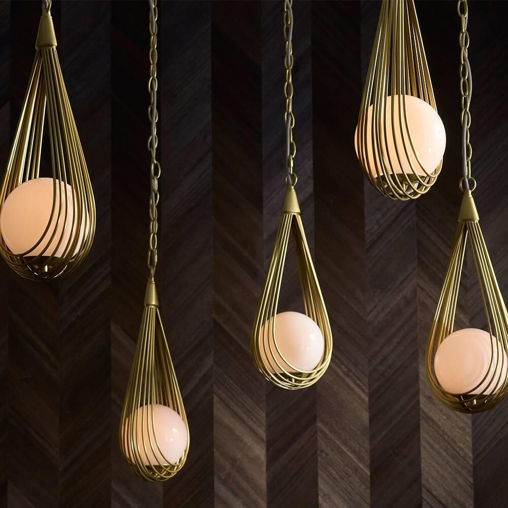 Shown in Antique Brass finish and Opal glass
