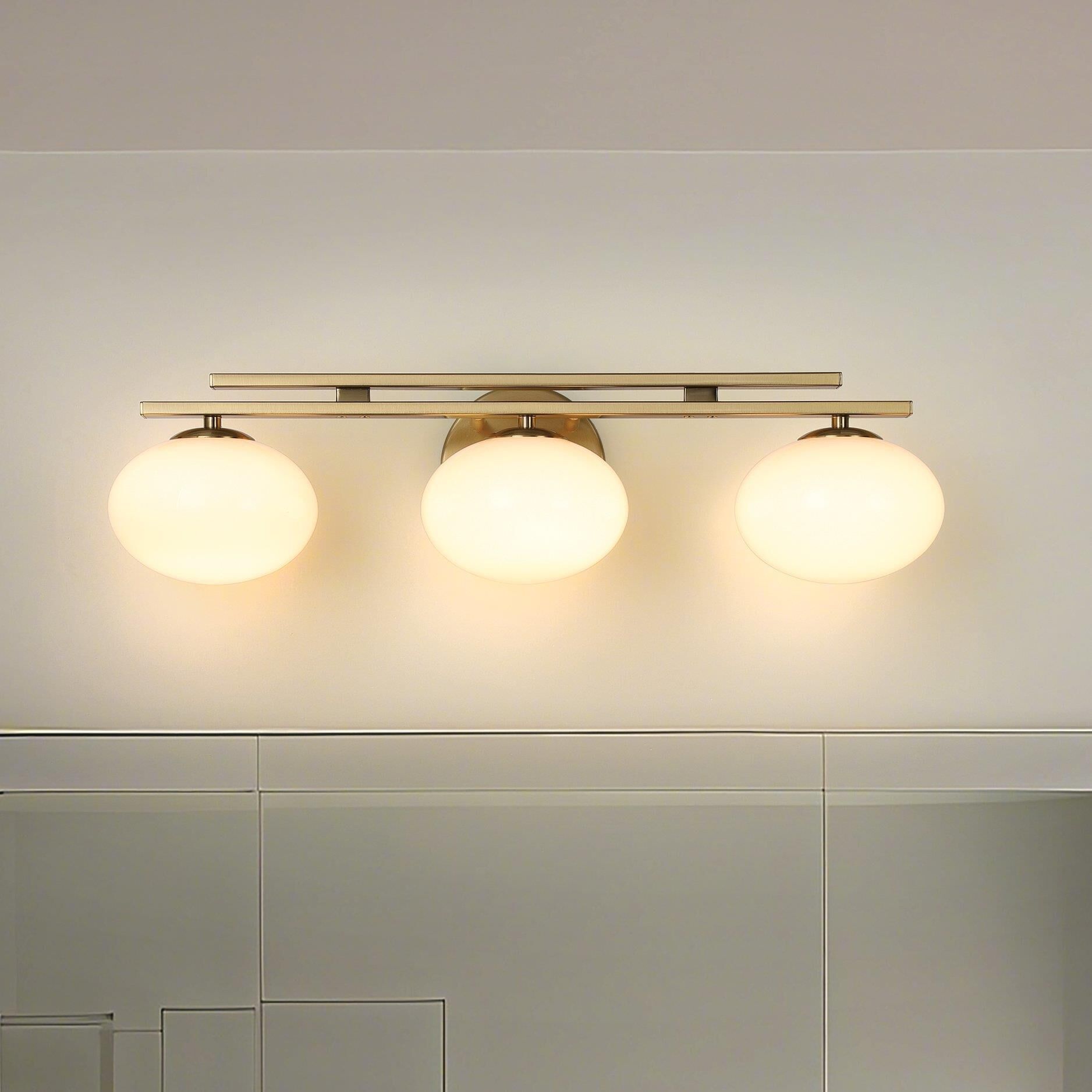 Shown in Brushed Gold finish and Opal glass