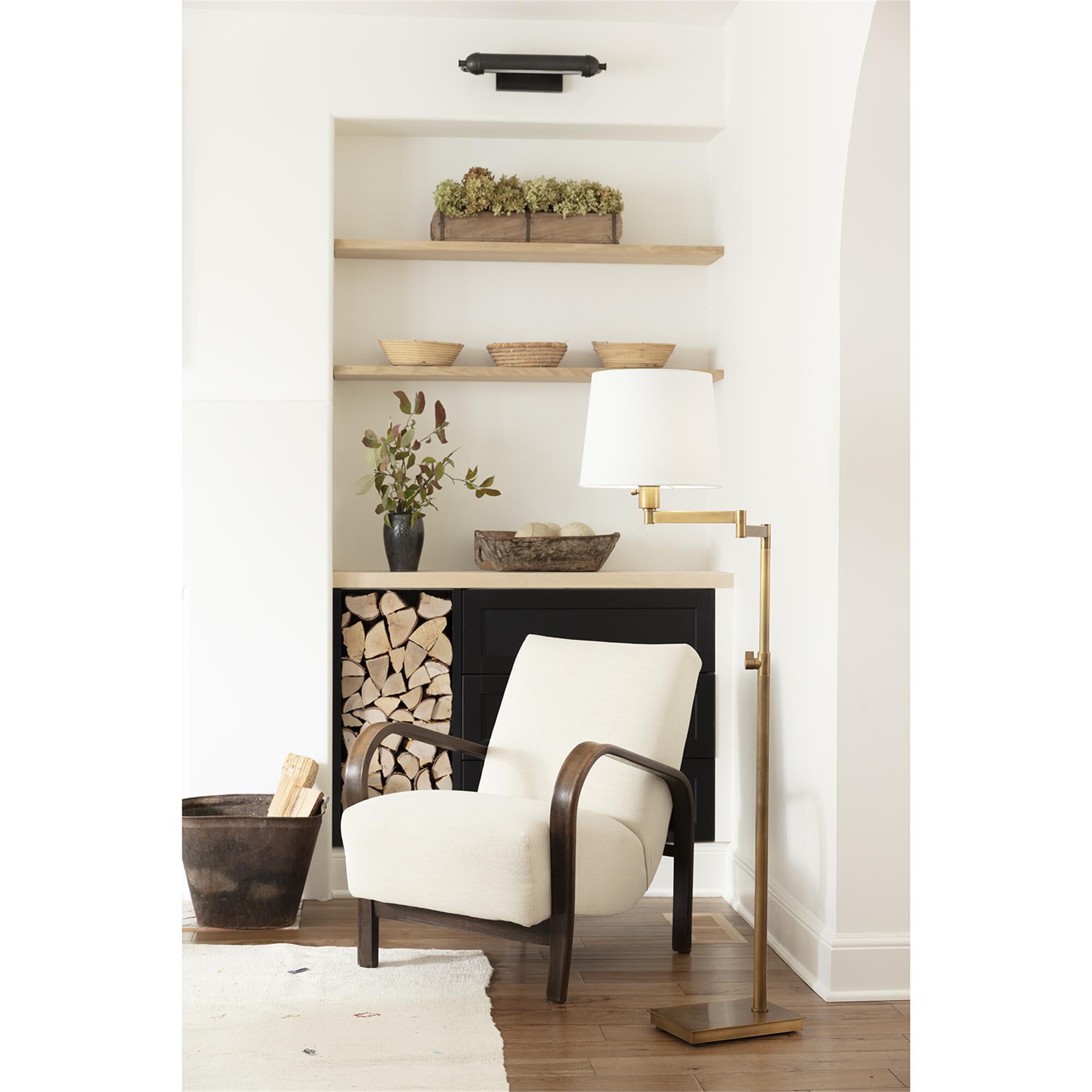 Shown in Natural Brass finish and Linen shade