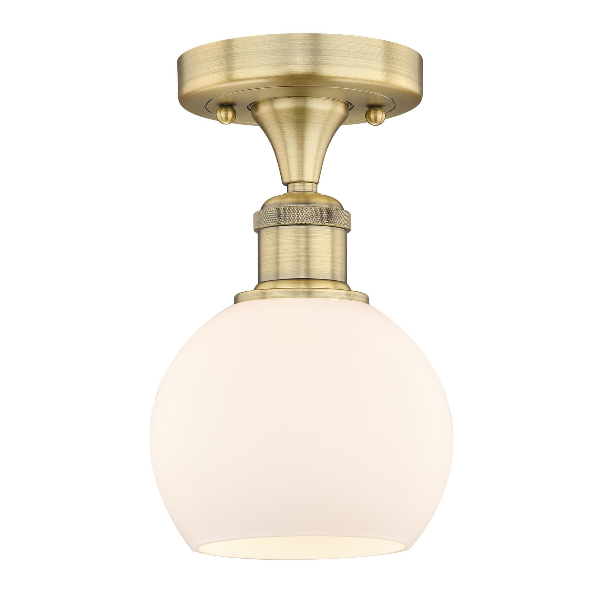 Shown in Brushed Brass finish and Matte White glass