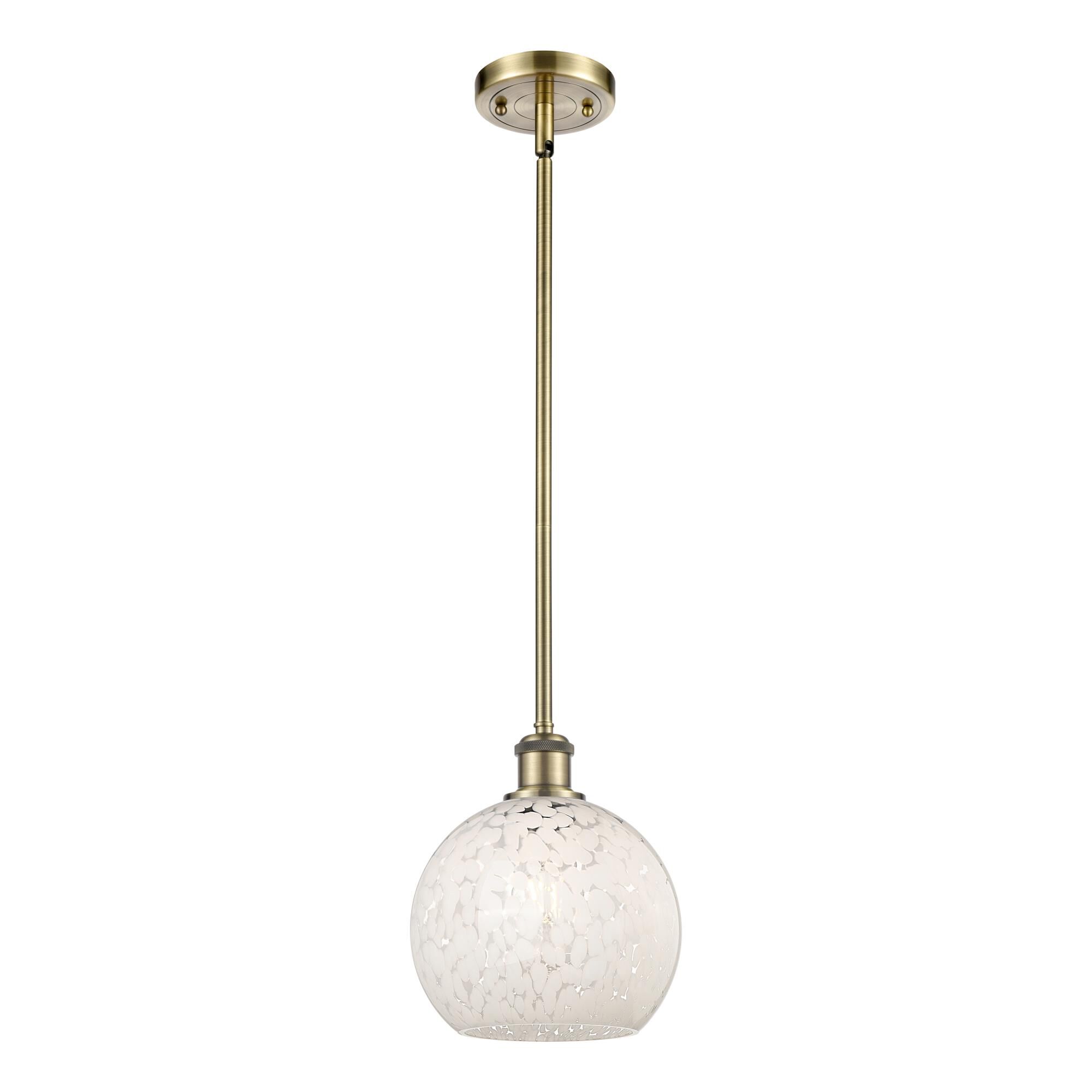 Shown in Antique Brass finish and White Mouchette glass