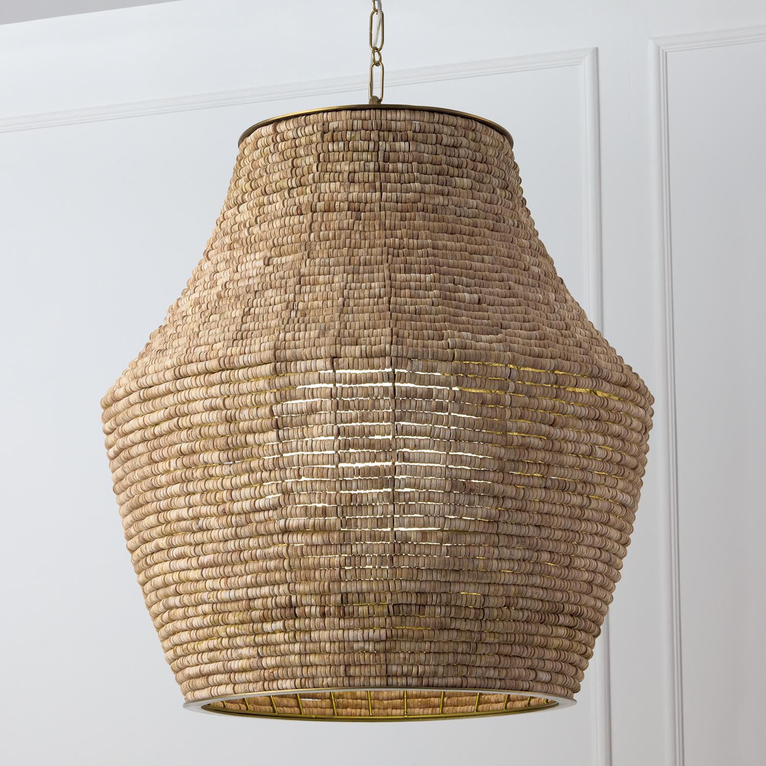 Shown in Light Fawn And Matte Brass finish and White  Globe glass