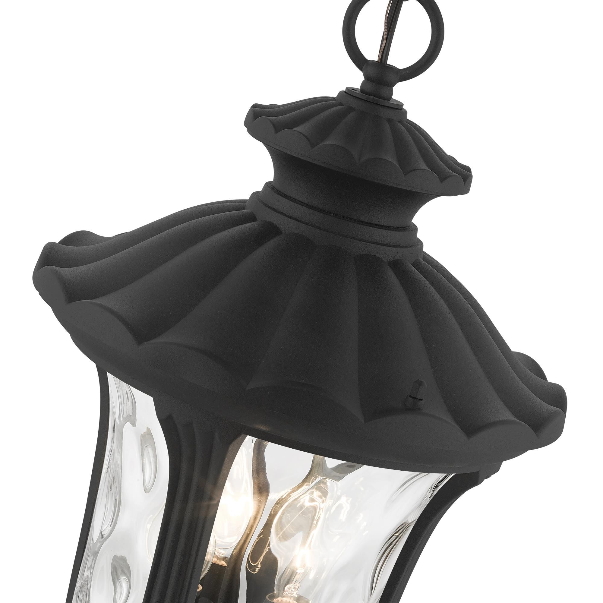 Shown in Textured Black finish and Hand Blown Clear Water glass and Hand Blown Clear Water Glass shade