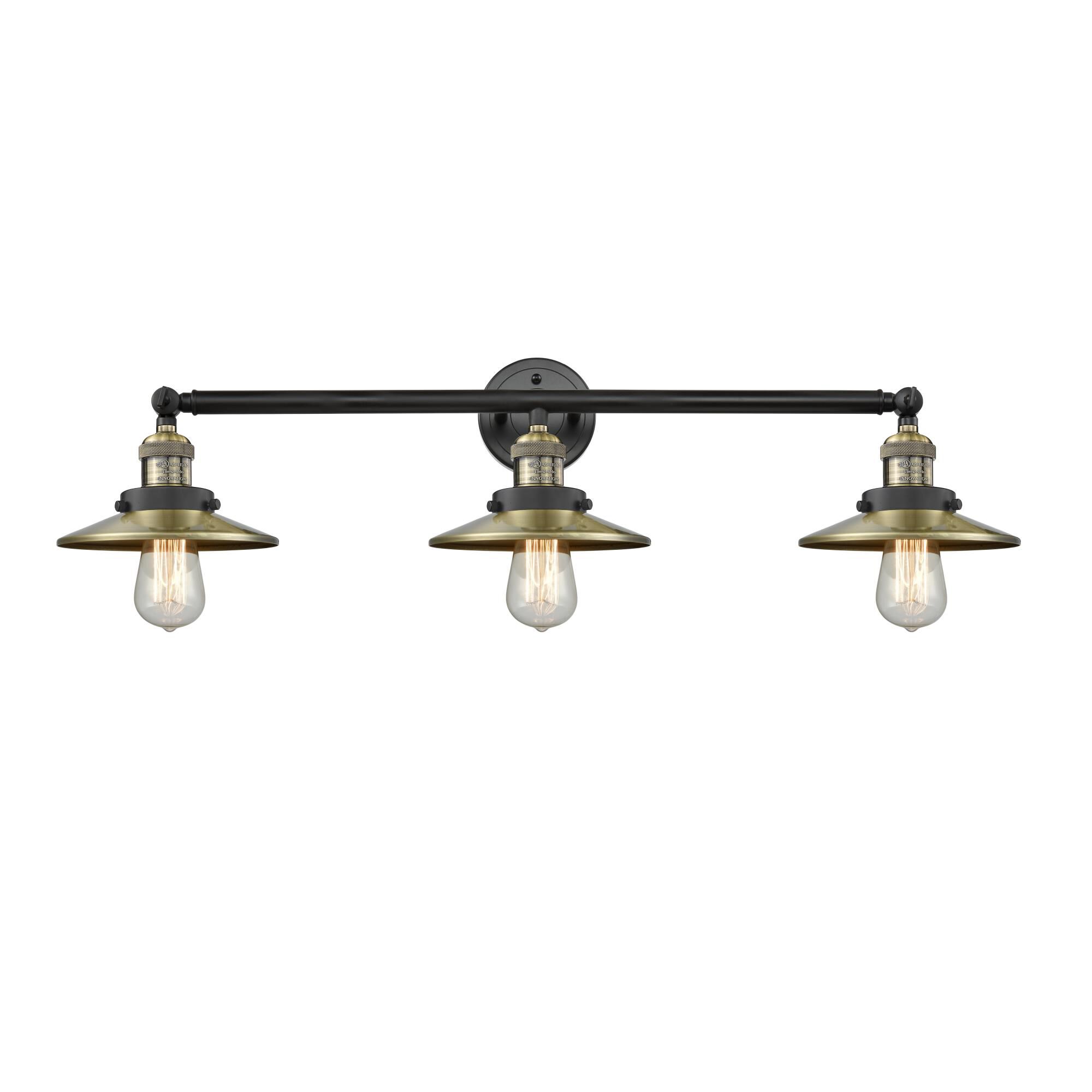 Shown in Black Antique Brass finish and Antique Brass Railroad shade