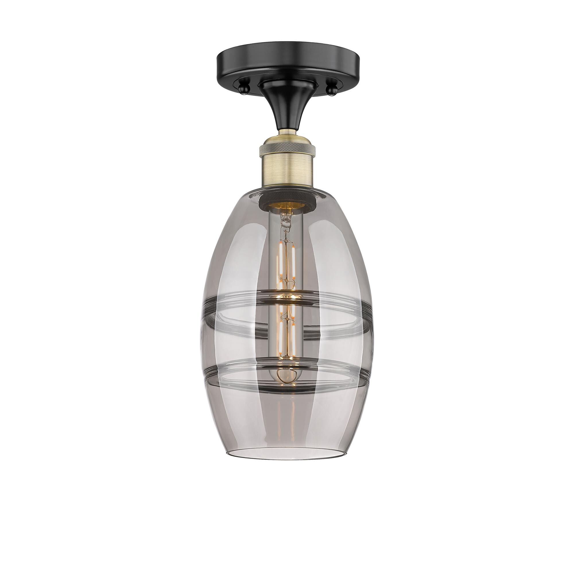 Shown in Black Antique Brass finish and Light Smoke glass