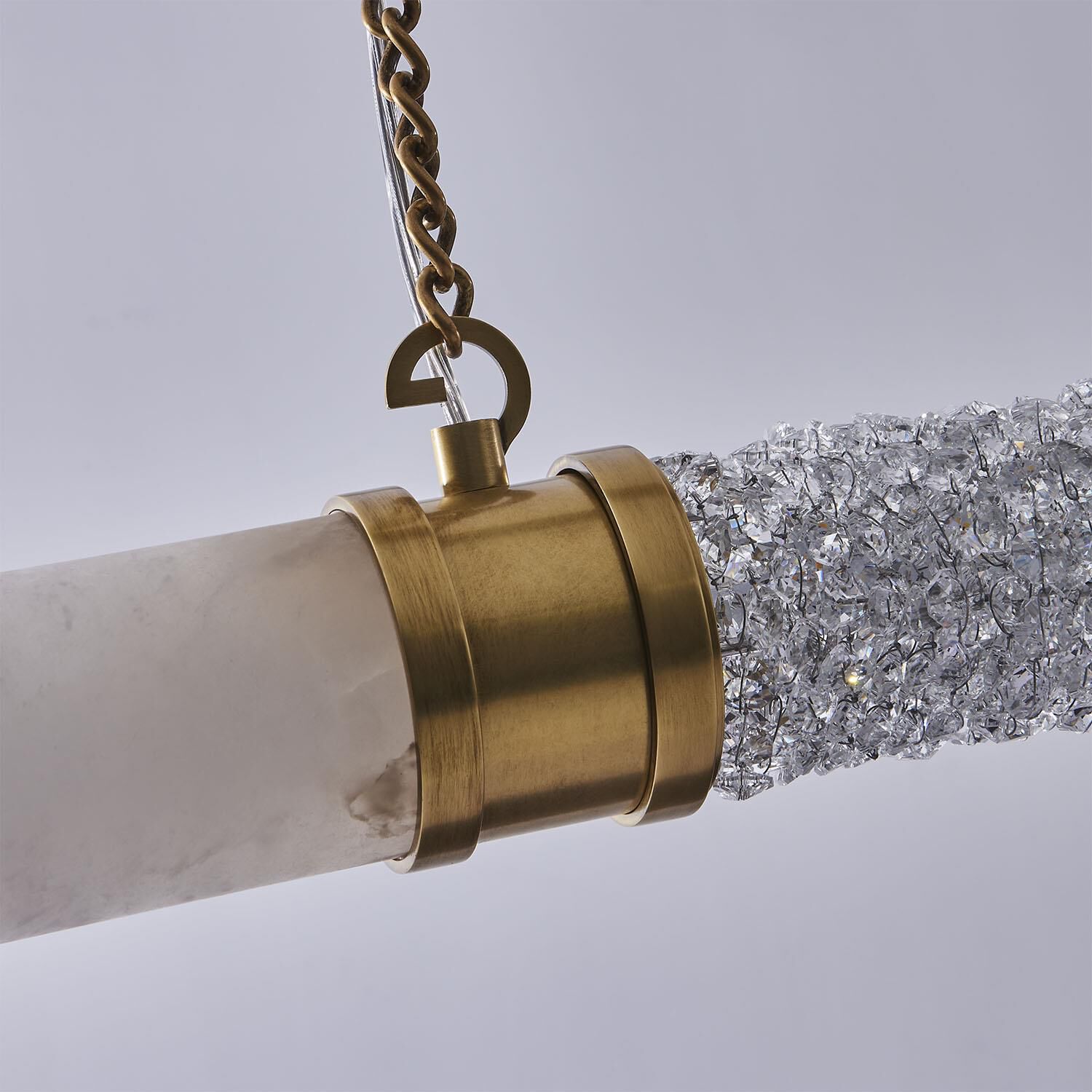 Shown in True Brass finish and Clear Firenze crystal and Alabaster shade