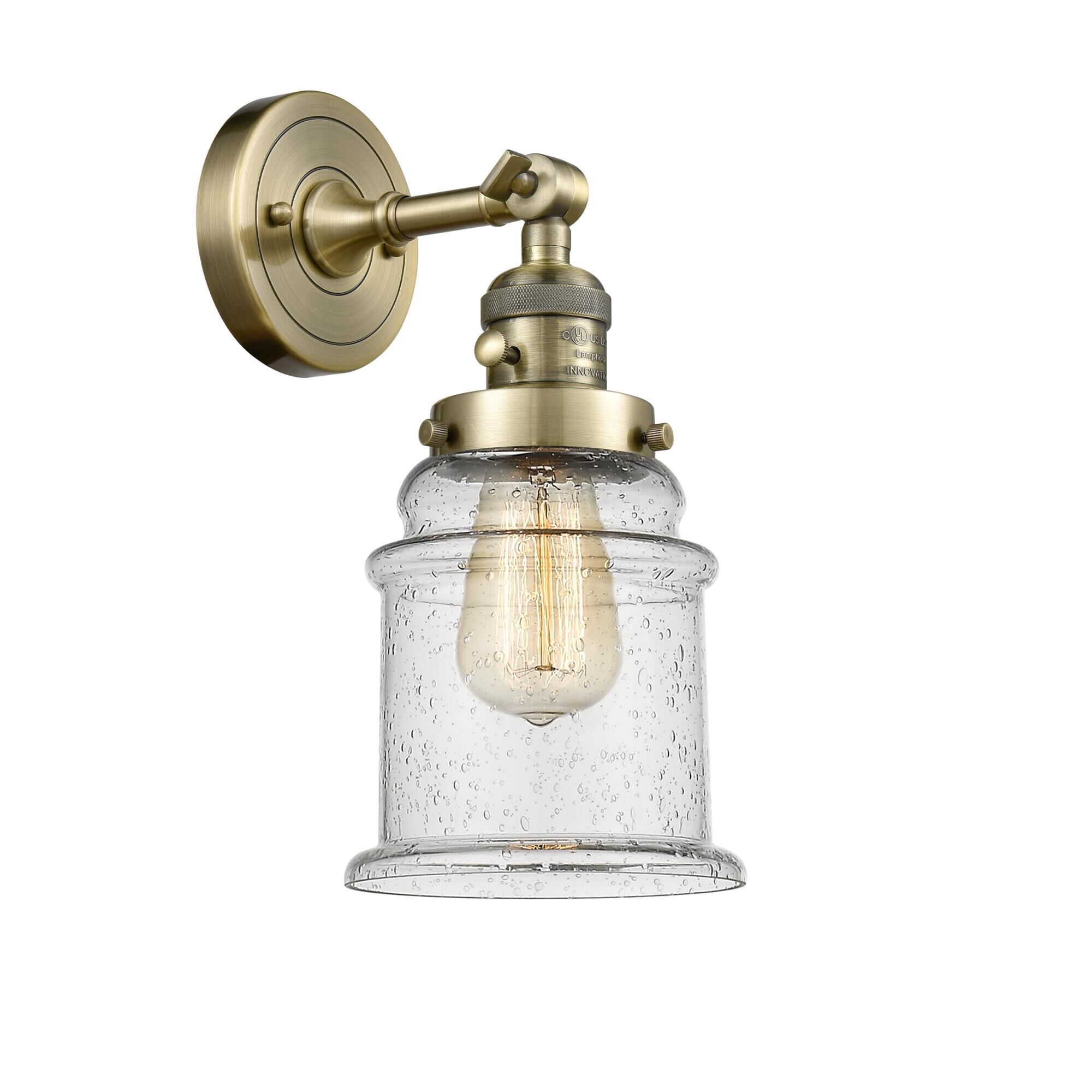 Shown in Antique Brass finish and Seedy glass and Switch on Socket accent
