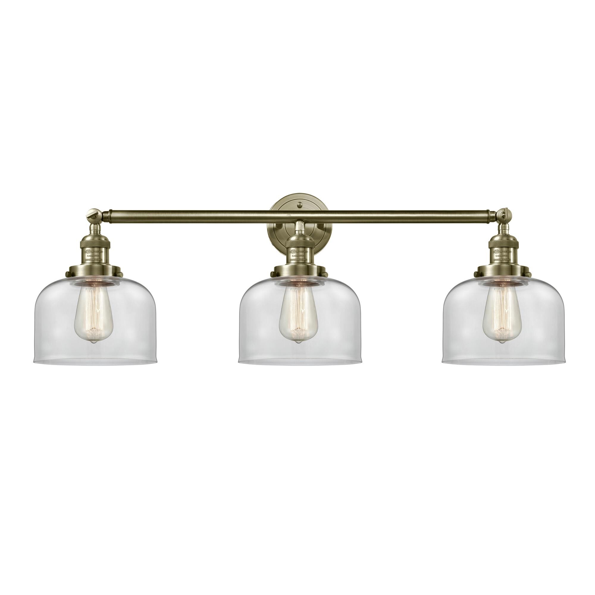 Shown in Antique Brass finish and Clear glass