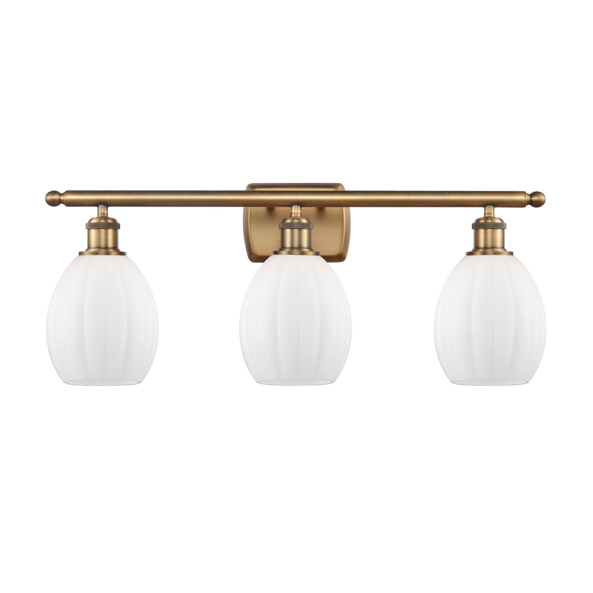 Shown in Brushed Brass finish and White Ribbed glass