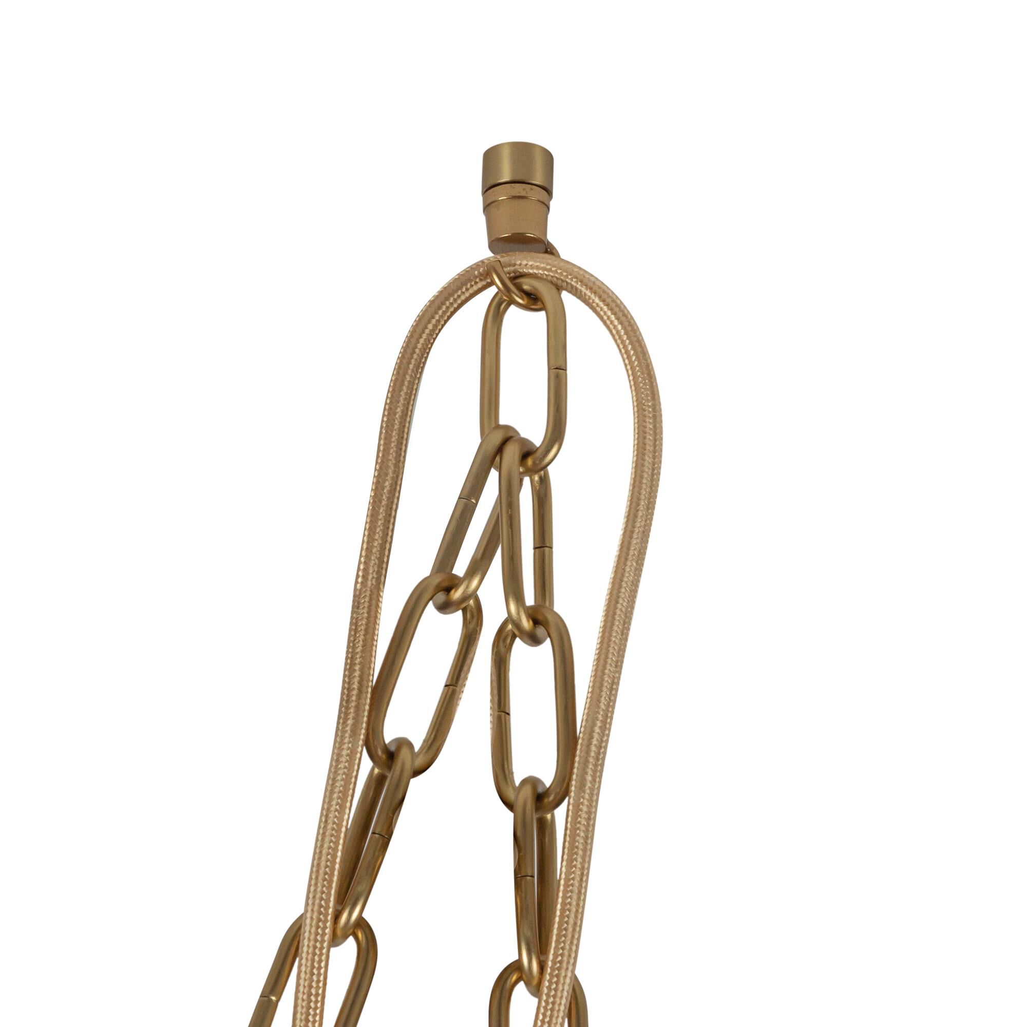 Shown in Brushed Gold finish and Amber Ribbed glass