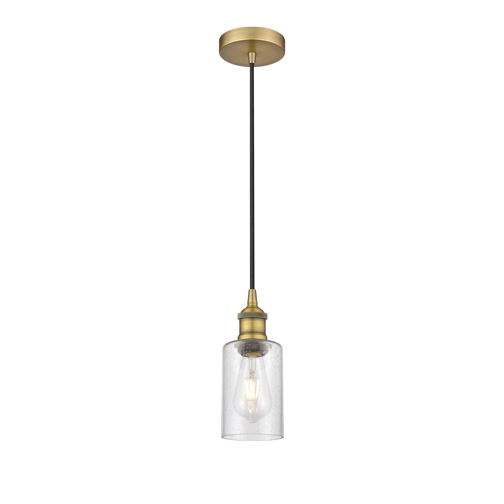 Shown in Brushed Brass finish and Seedy glass