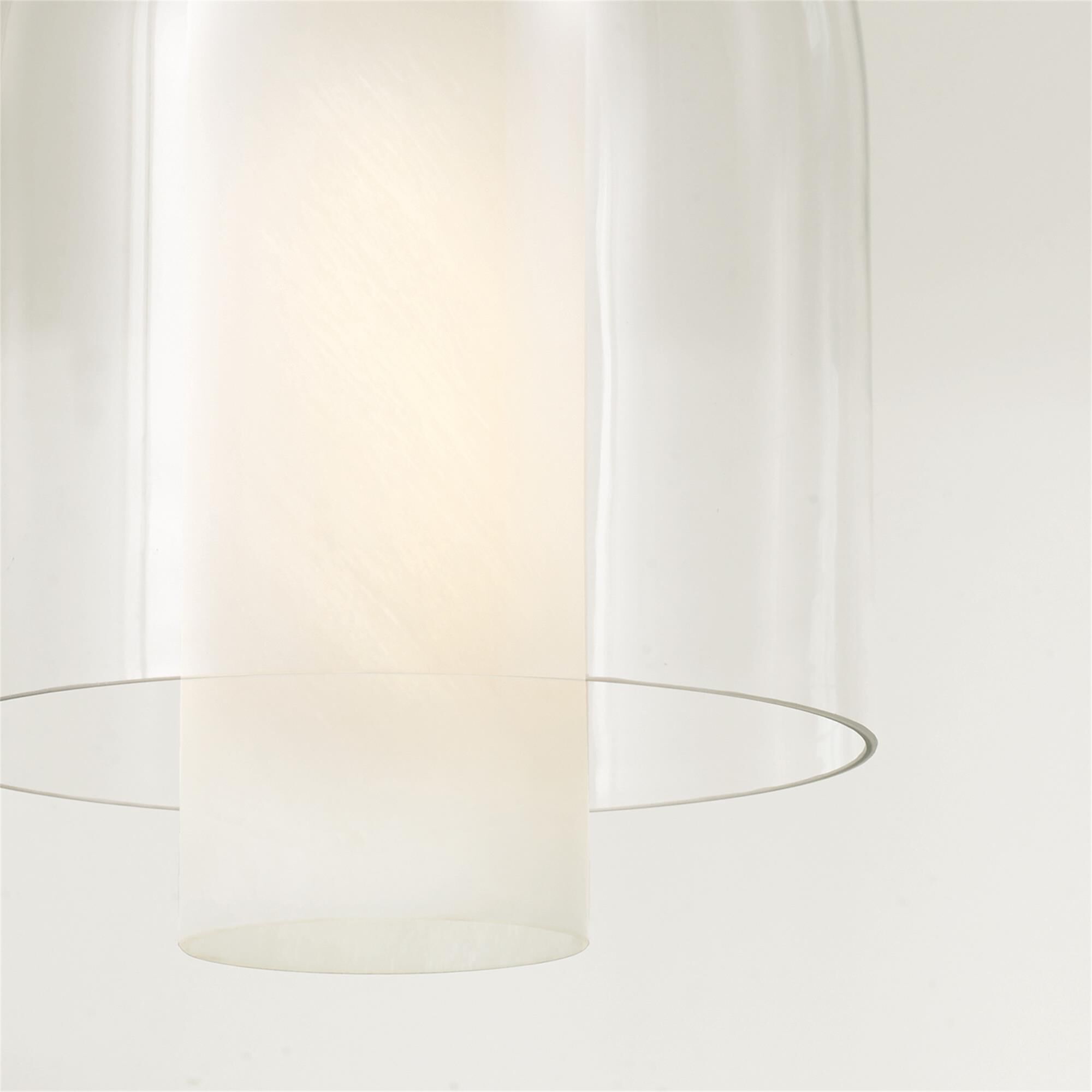 Shown in Aged Brass finish and Clear And Faux Alabaster glass