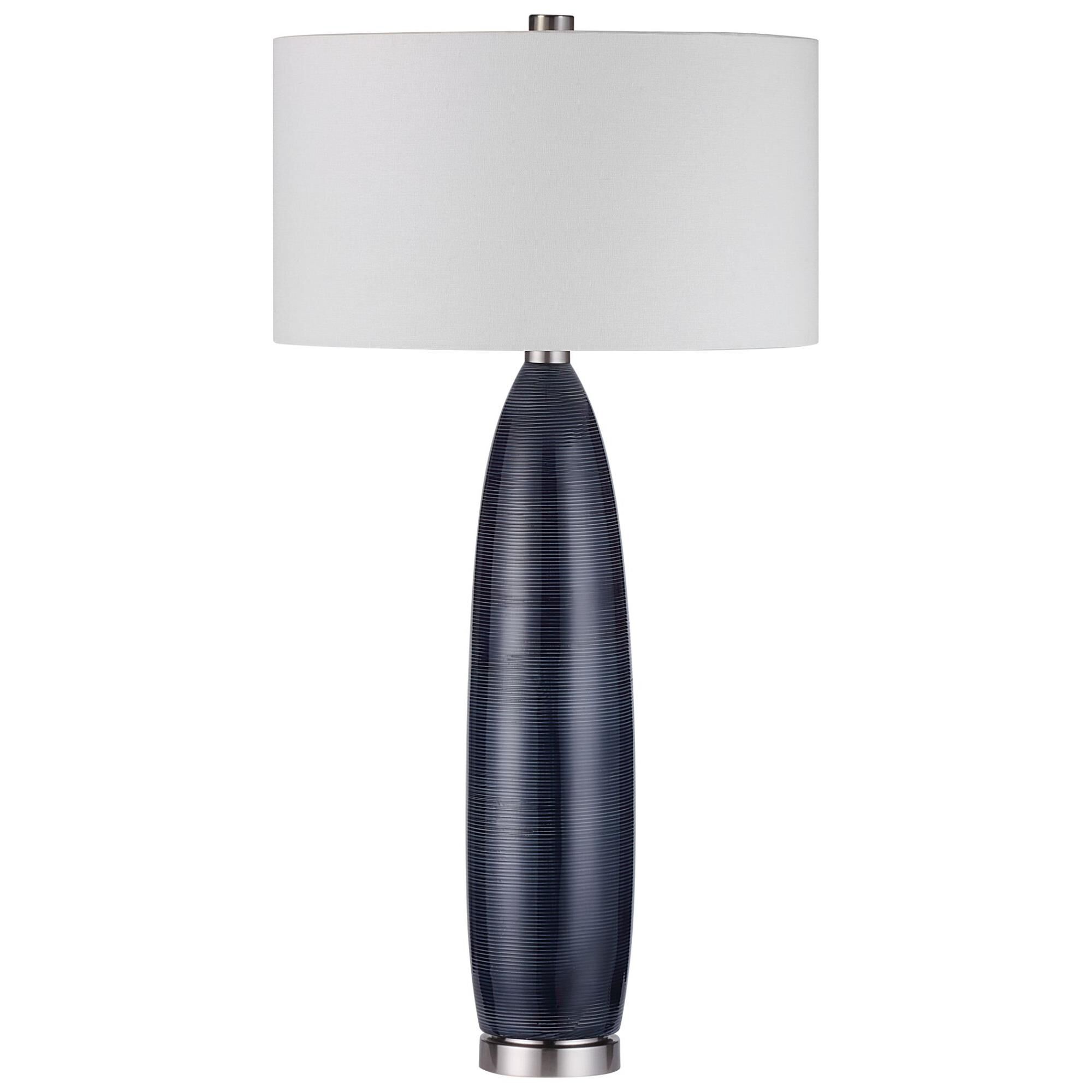 Shown in This Handcrafted Ceramic Table Lamp Showcases An Elevated Look With A Striped Motif And A Prussian B finish and Round Hardback Drum shade
