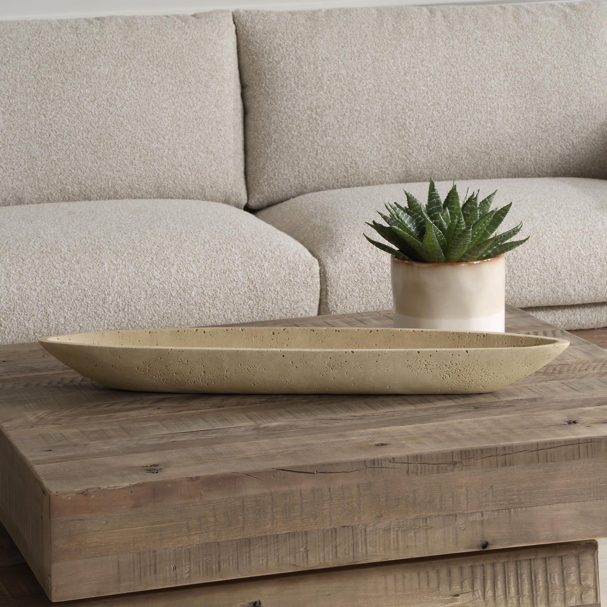 Shown in Embrace The Perfect Fusion Of Aesthetics And Utility With This Canoe-Shaped Bowl, Crafted From A Uni finish