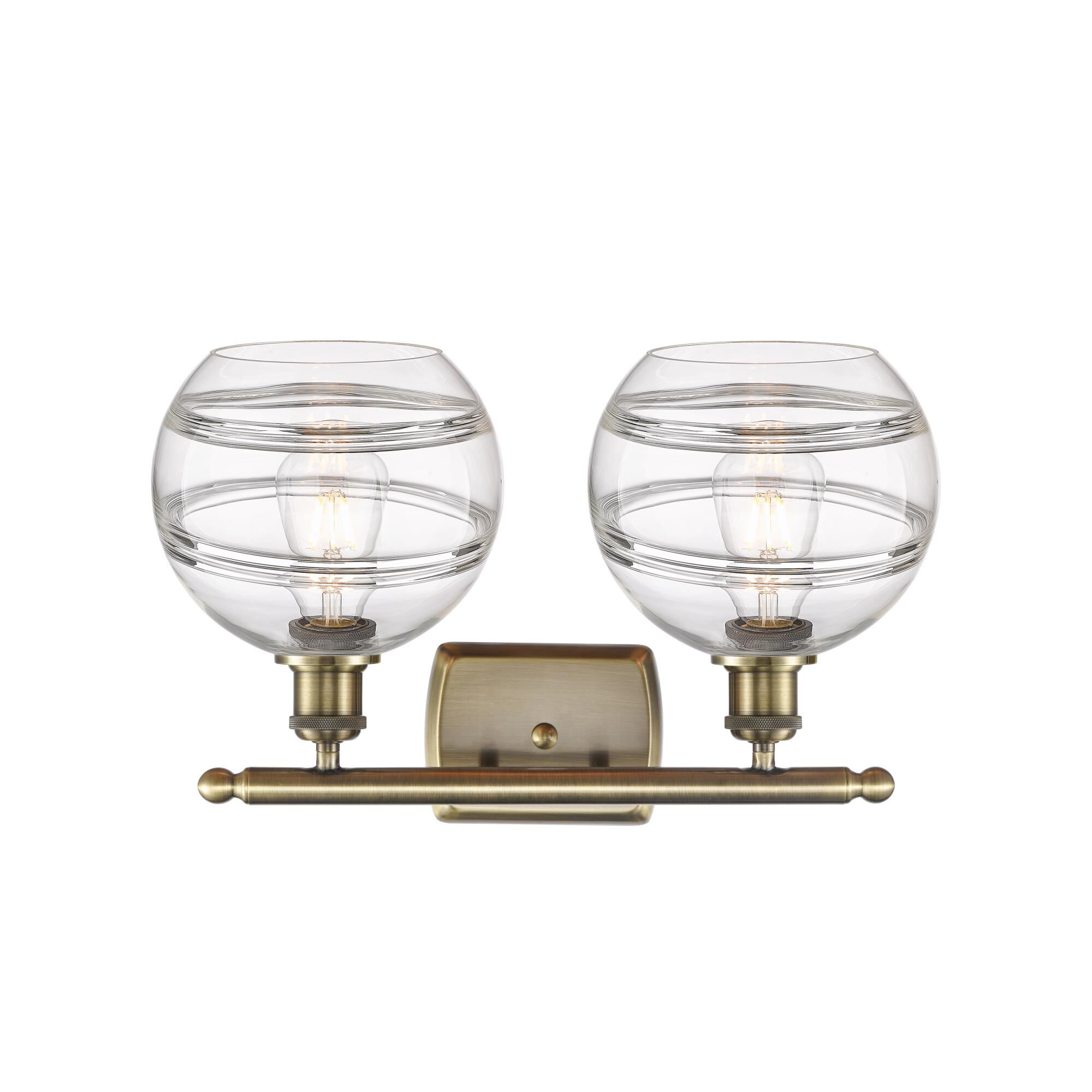 Shown in Antique Brass finish and Clear glass