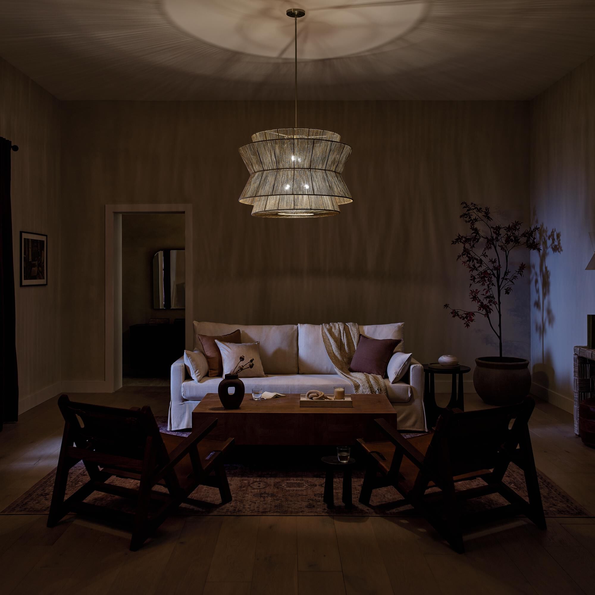 Shown in Champagne Bronze finish and Natural Fibers Textured shade