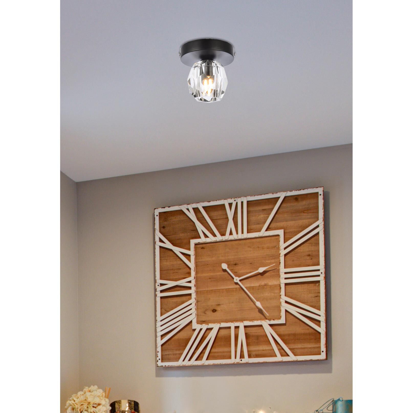 Shown in Black finish and Clear Royal Cut crystal