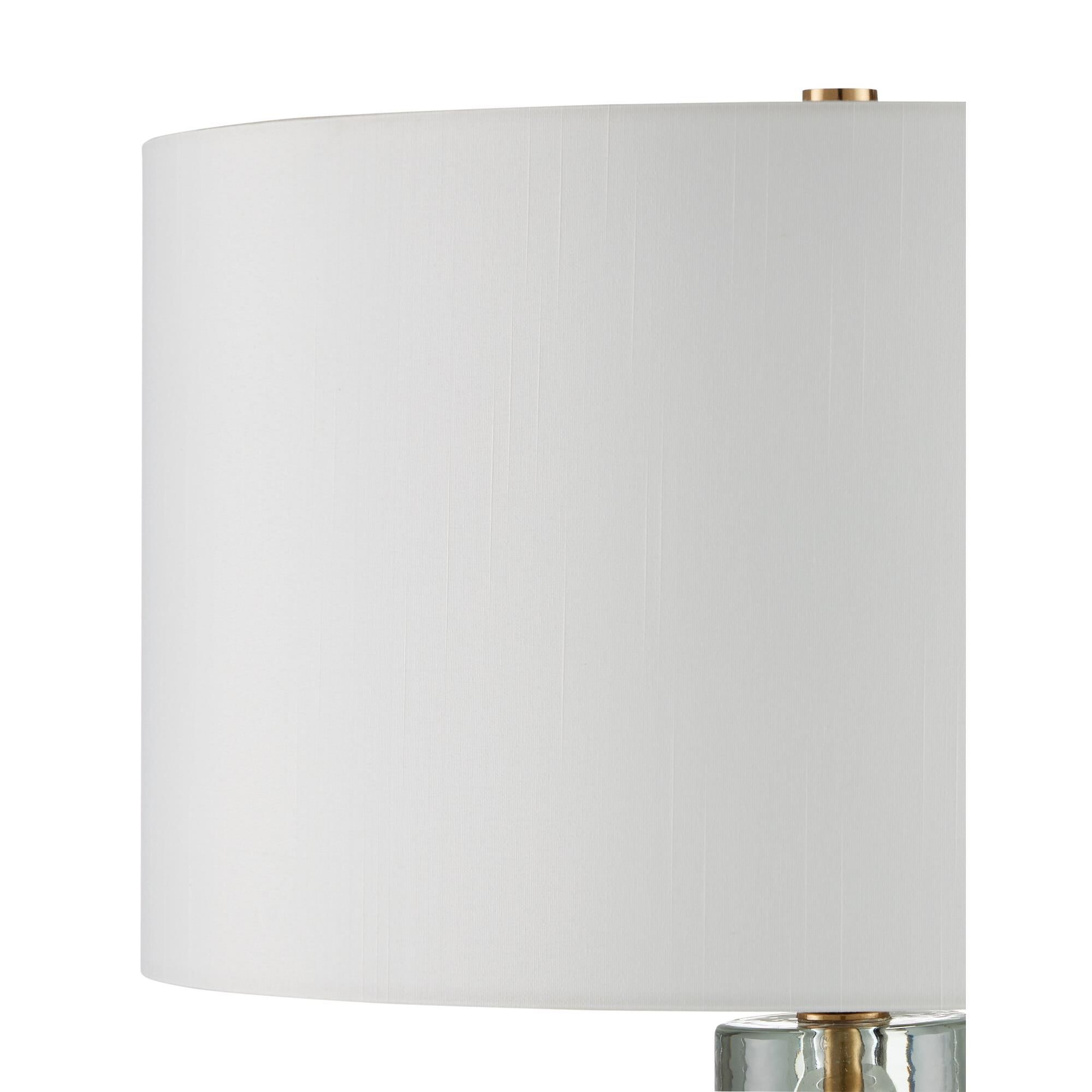 Shown in Clear, Antique Brass finish and Off-White Linen shade