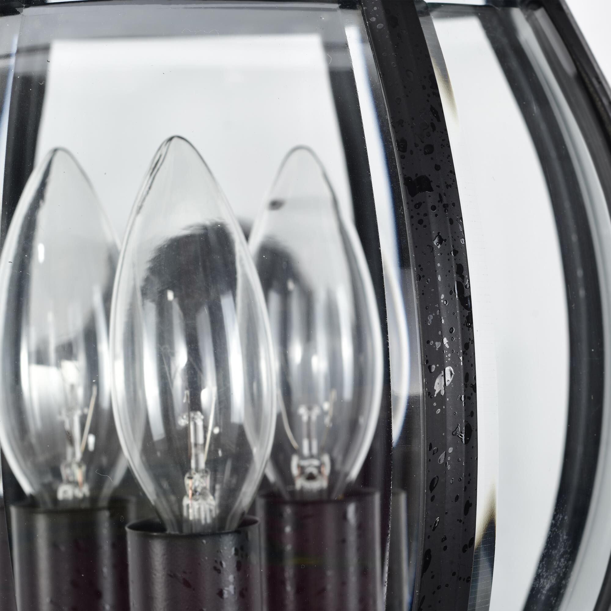 Shown in Textured Black finish and Clear Beveled Panels glass