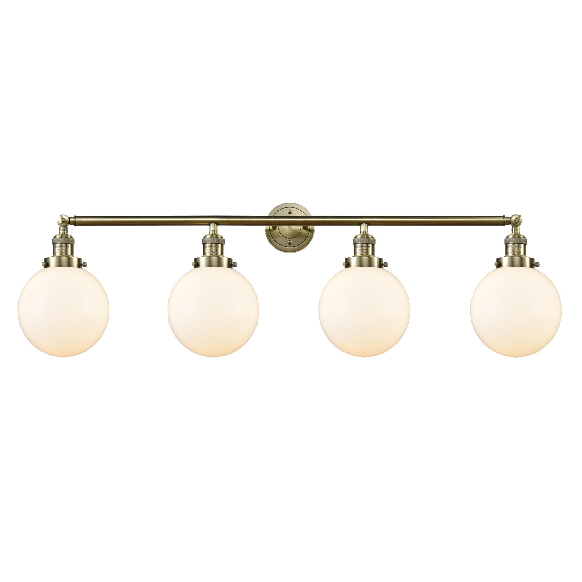 Shown in Antique Brass finish and Matte White Cased Beacon glass