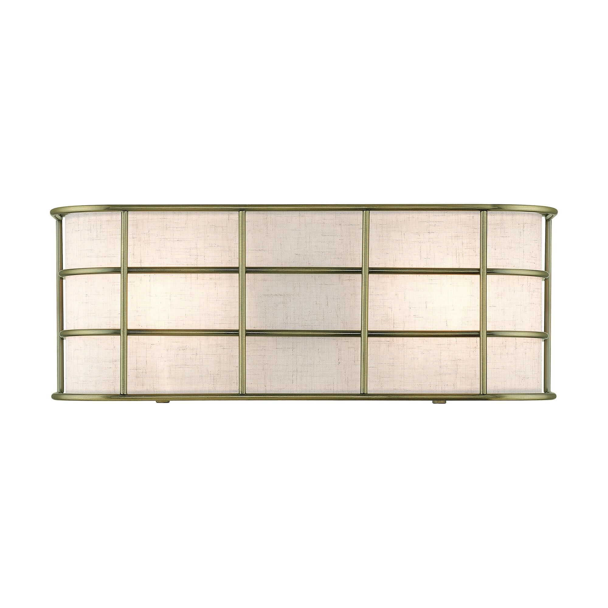 Shown in Antique Brass finish and Hand Crafted Oatmeal Color Hardback Fabric shade