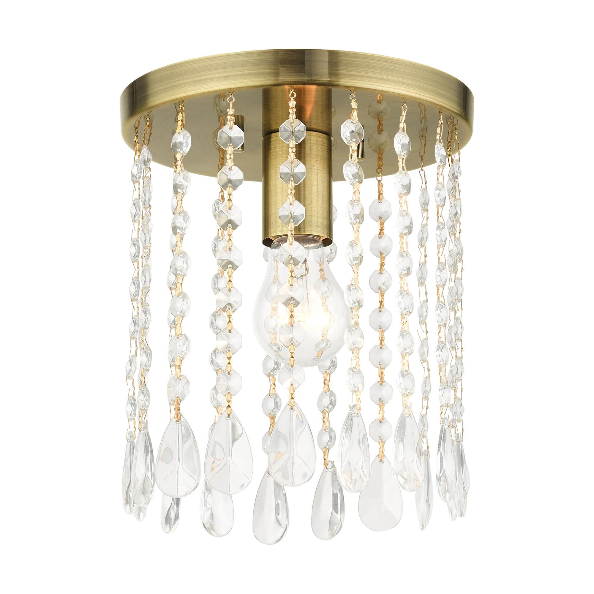 Shown in Antique Brass finish and Hand Assembled Crystal Shade glass