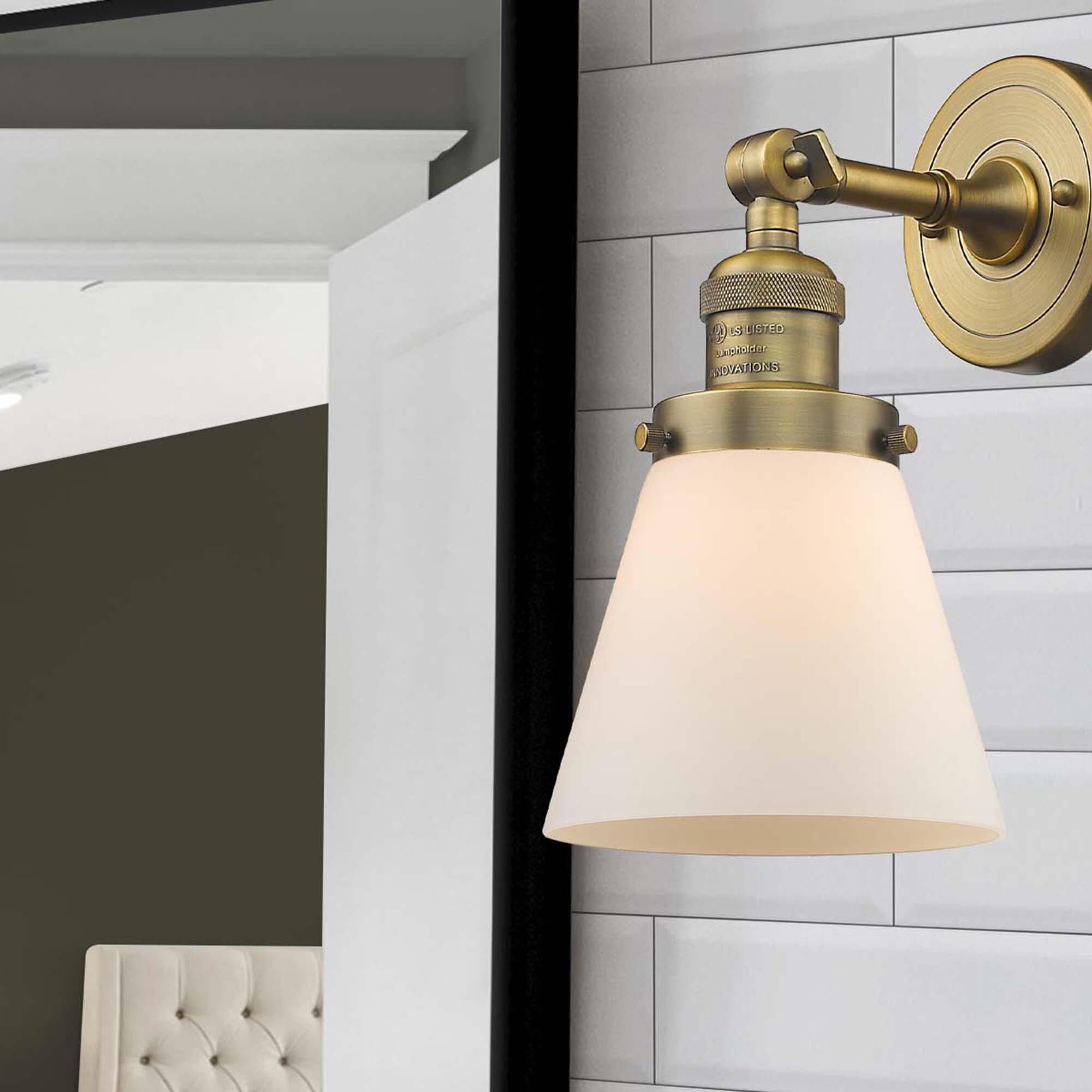 Shown in Brushed Brass finish and Matte White Cased glass