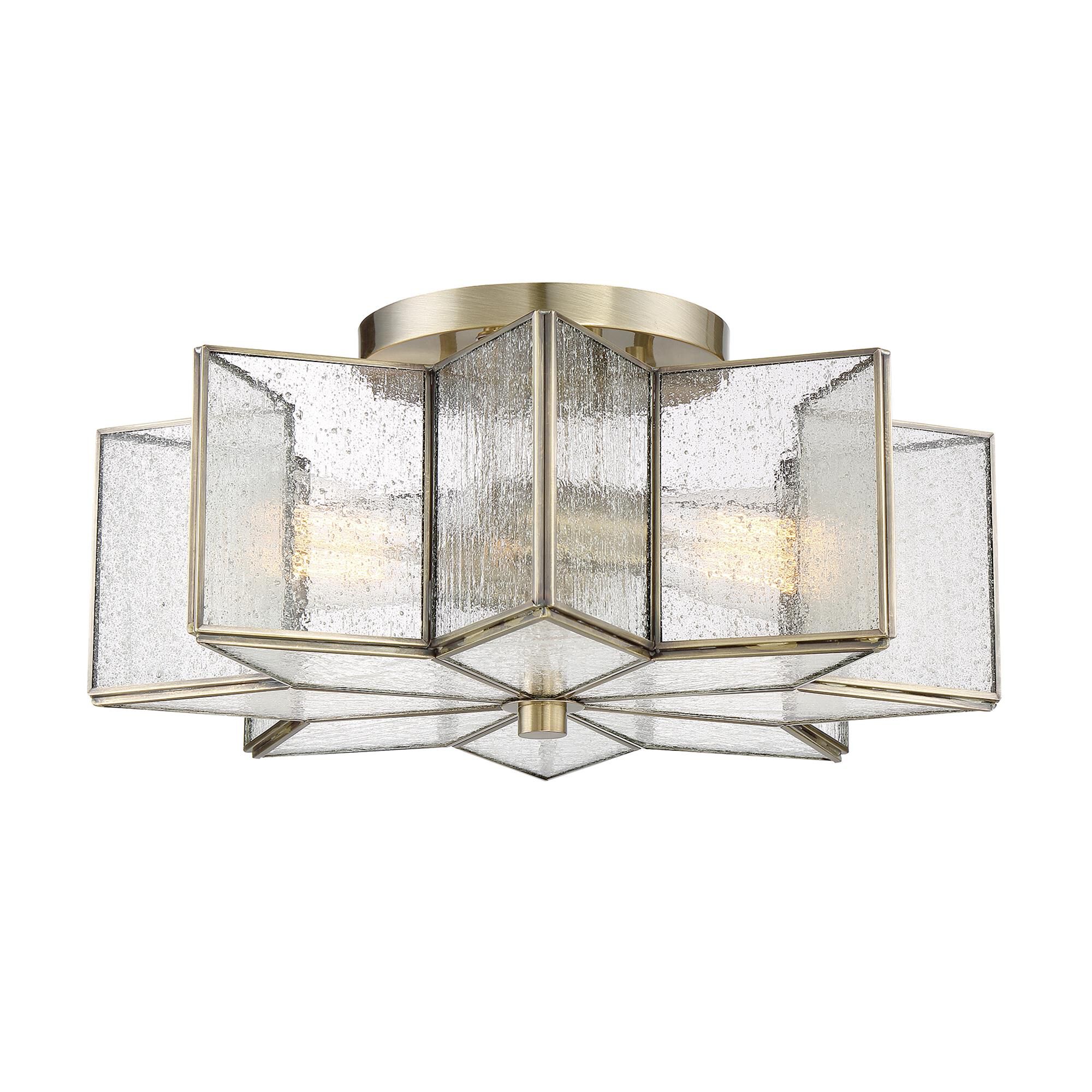 Shown in Natural Brass finish and Clear Seeded glass