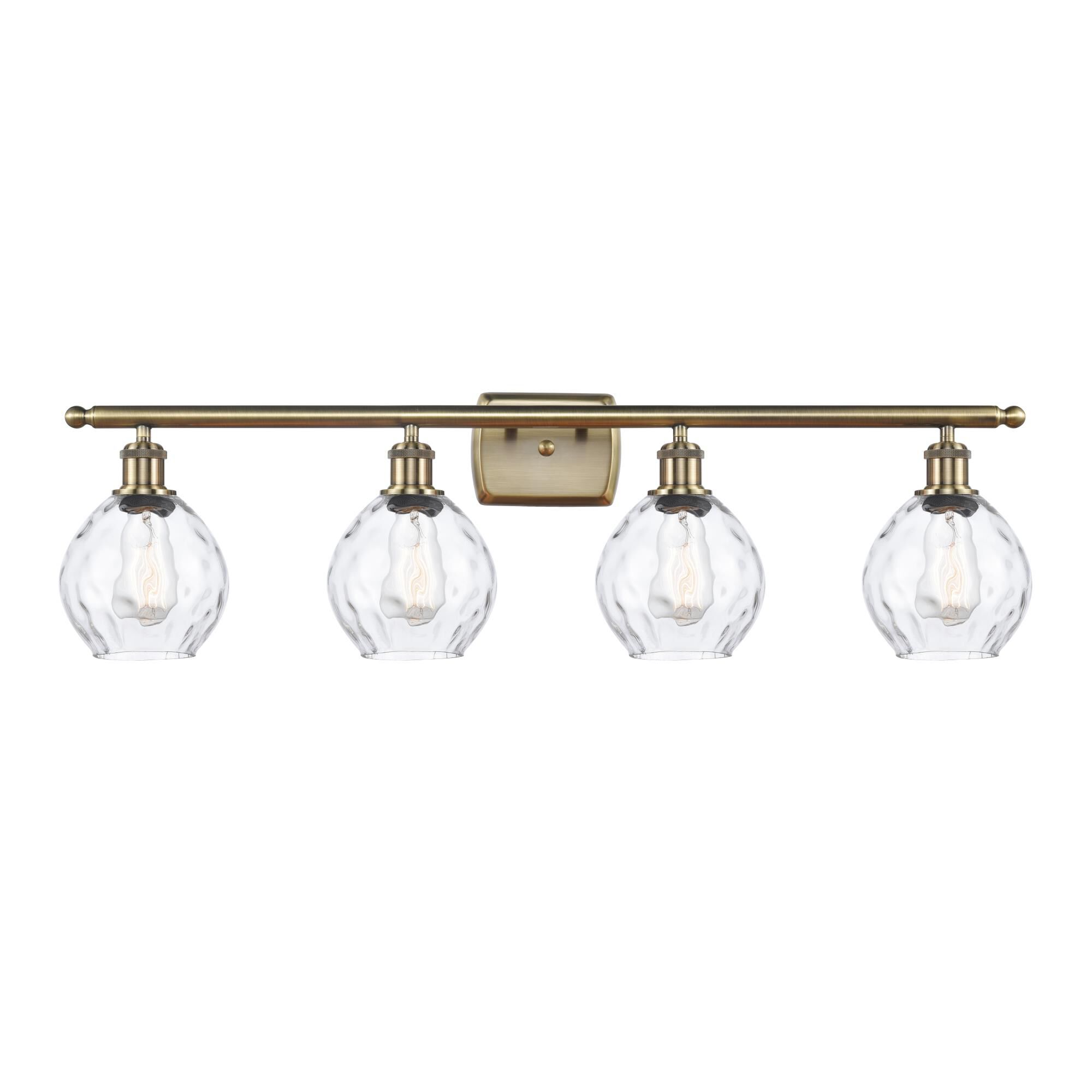 Shown in Antique Brass finish and Sphere glass and Glass shade