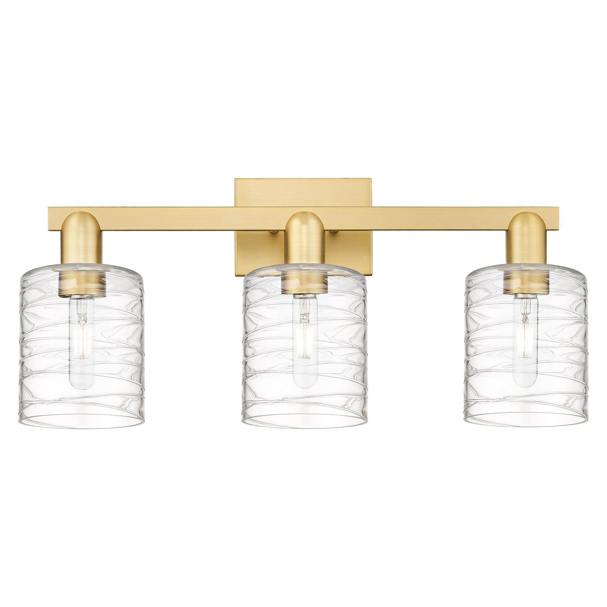 Shown in Satin Gold finish and Deco Swirl glass