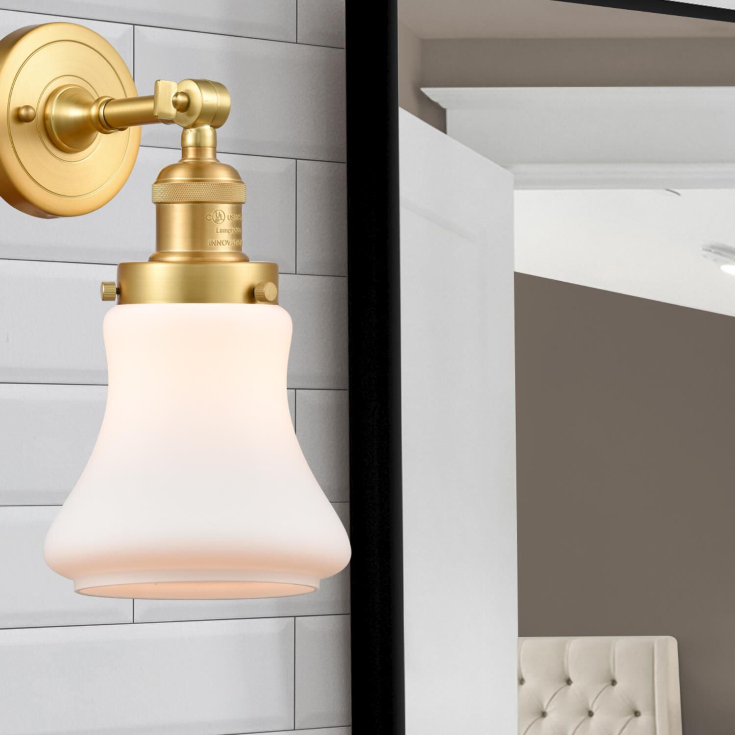 Shown in Satin Gold finish and Matte White Bellmont glass