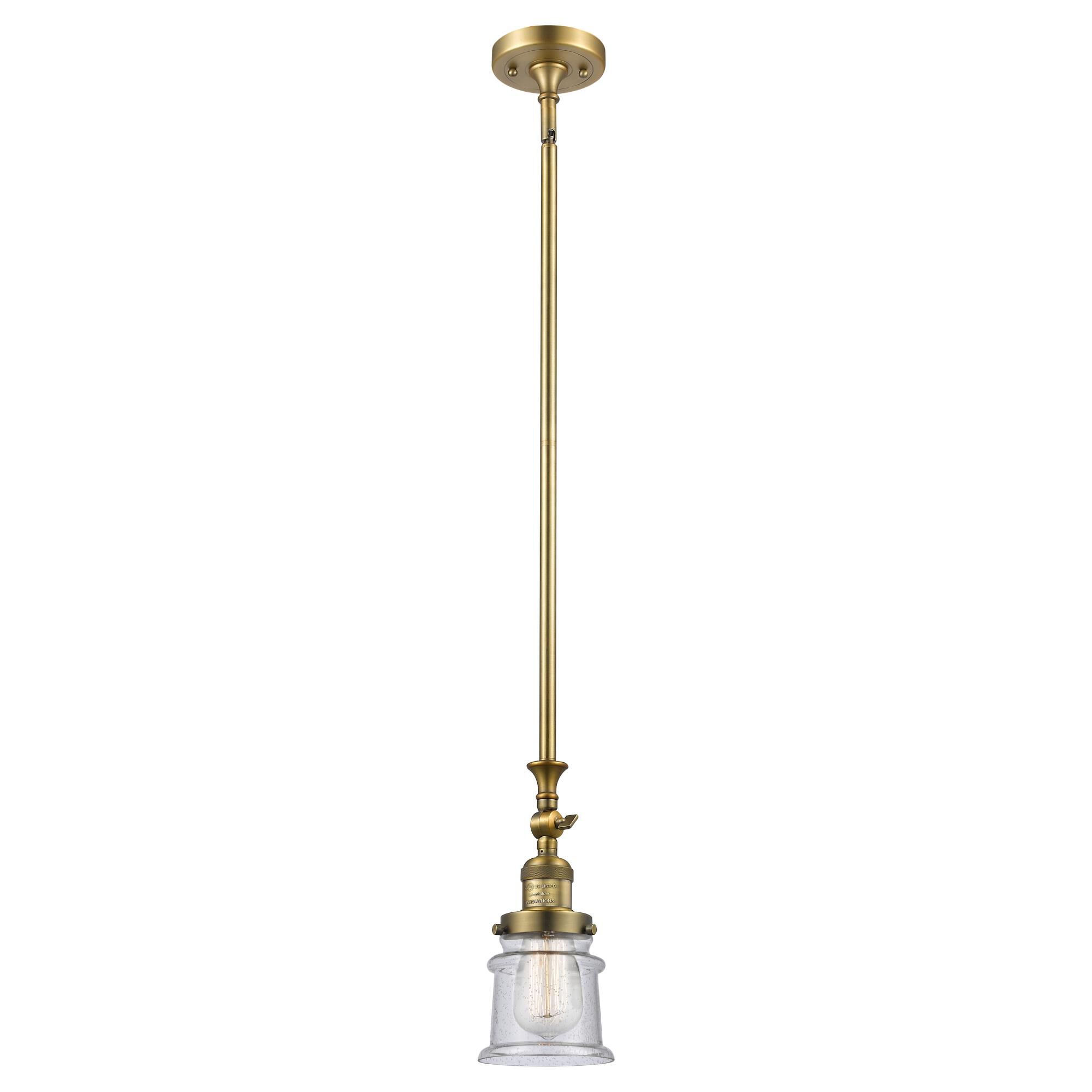 Shown in Brushed Brass finish and Seedy glass