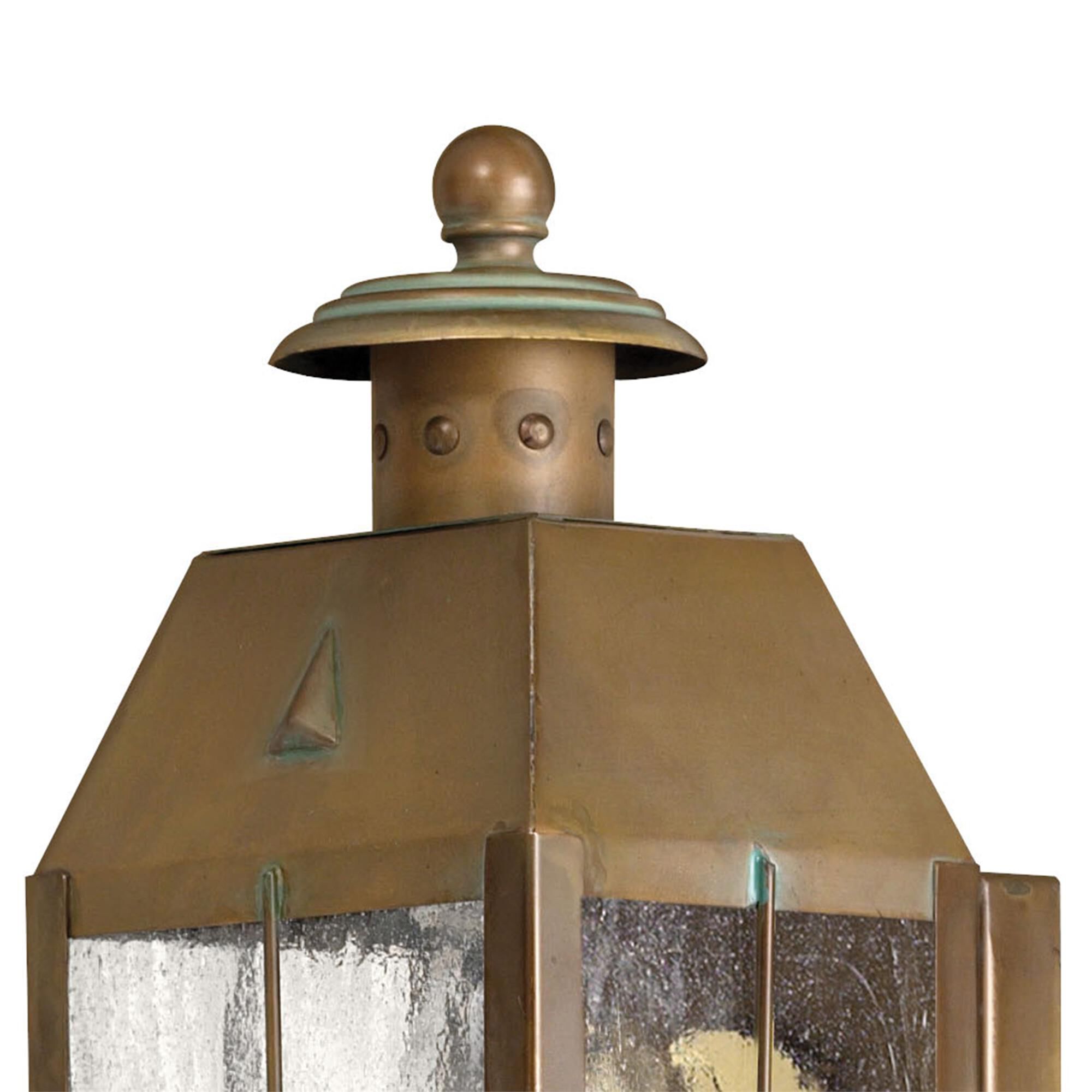 Shown in Aged Brass finish and Clear Seedy Panels glass