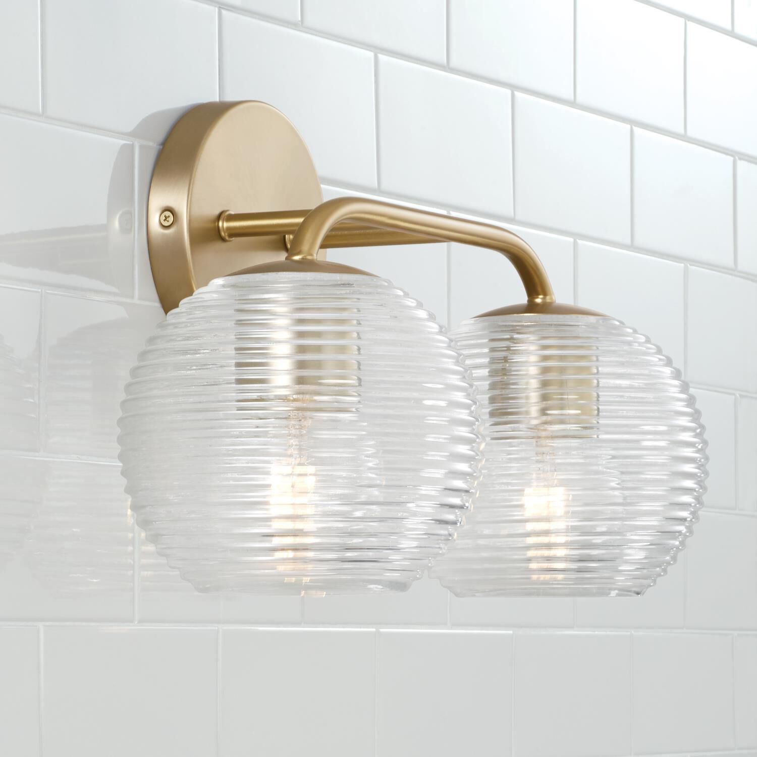 Shown in Matte Brass finish and Clear Ribbed glass