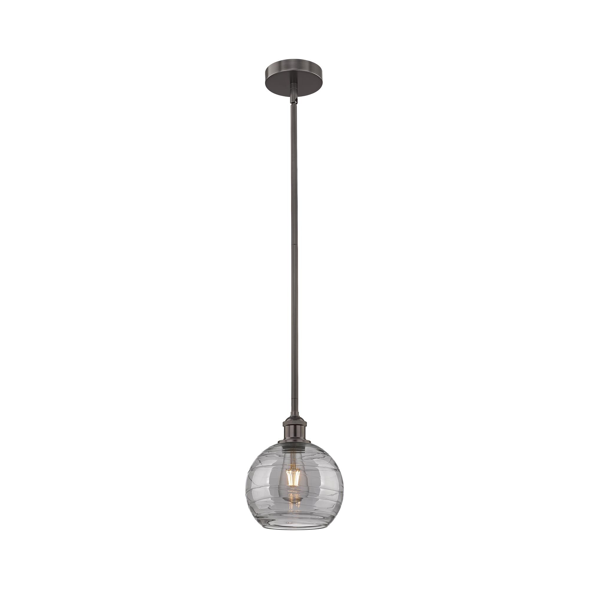 Shown in Oil Rubbed Bronze finish and Light Smoke Deco Swirl glass