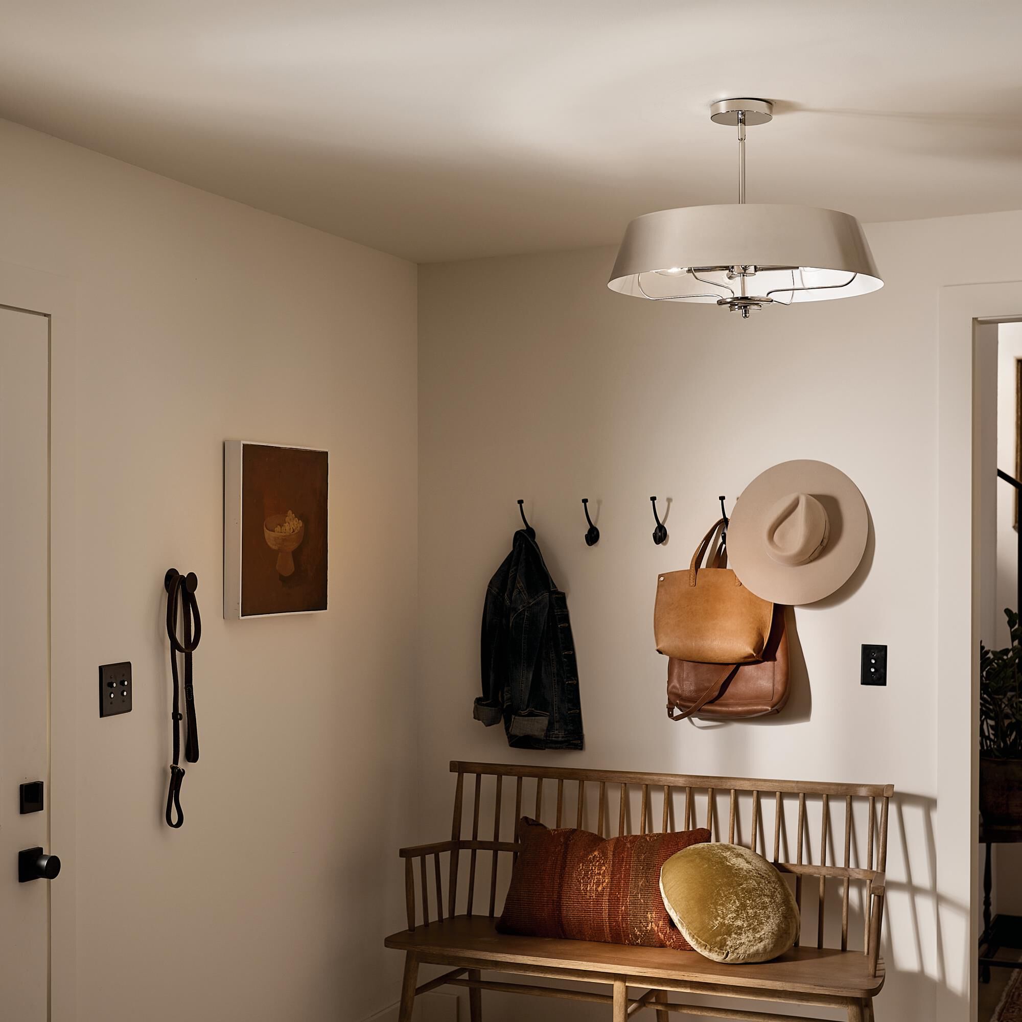 Shown in Polished Nickel finish and Metal shade