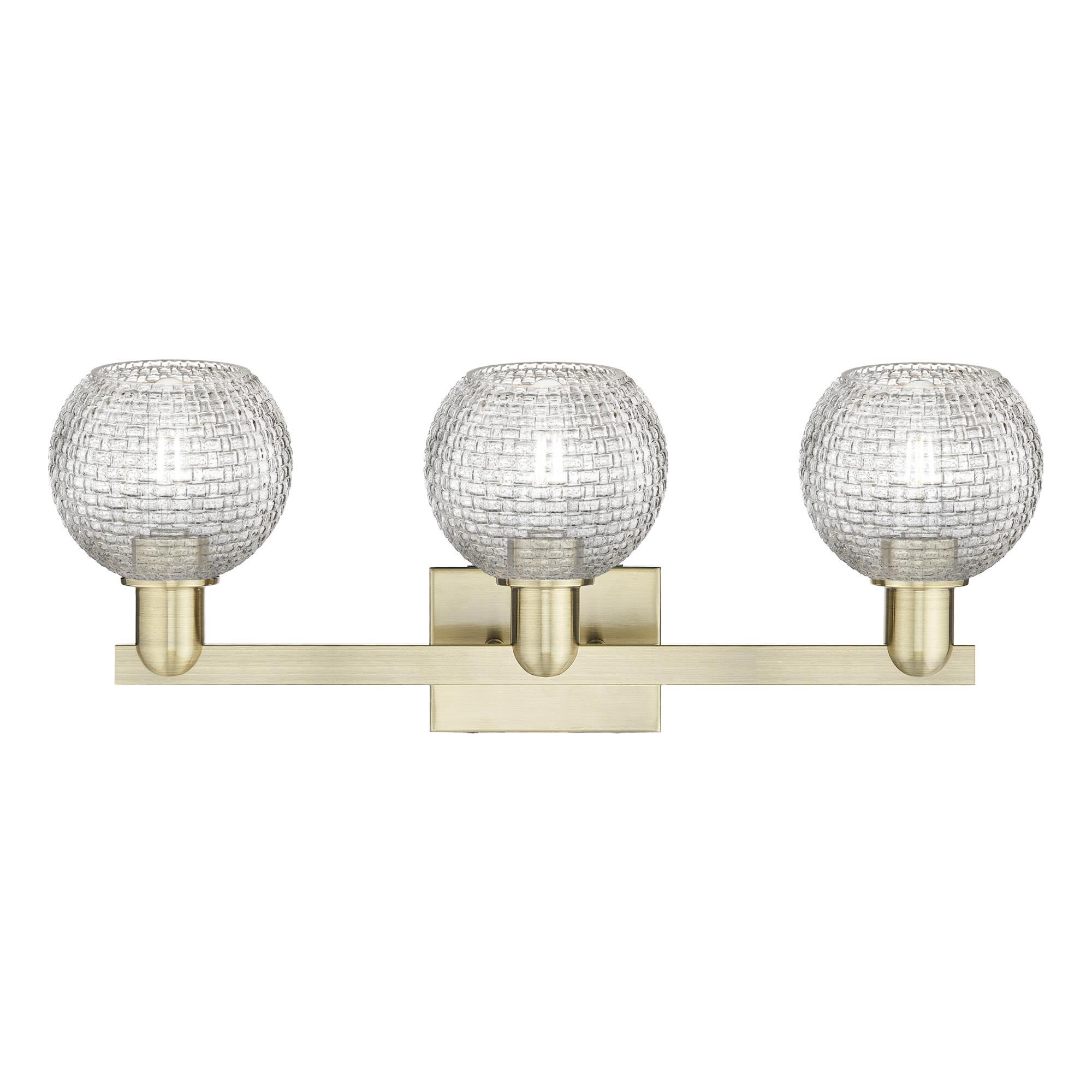 Shown in Antique Brass finish and Clear Basketweave glass