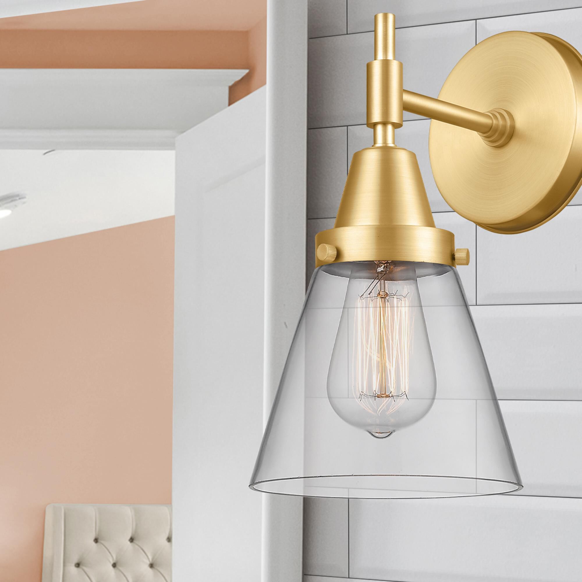 Shown in Satin Gold finish and Clear Small Cone glass