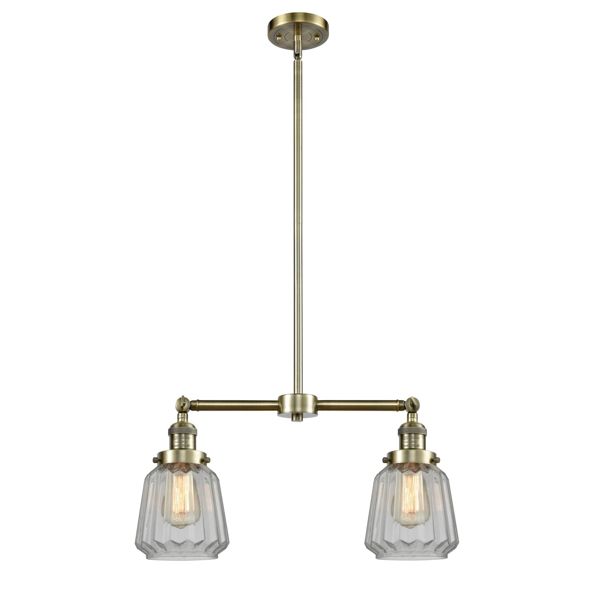 Shown in Antique Brass finish and Clear glass
