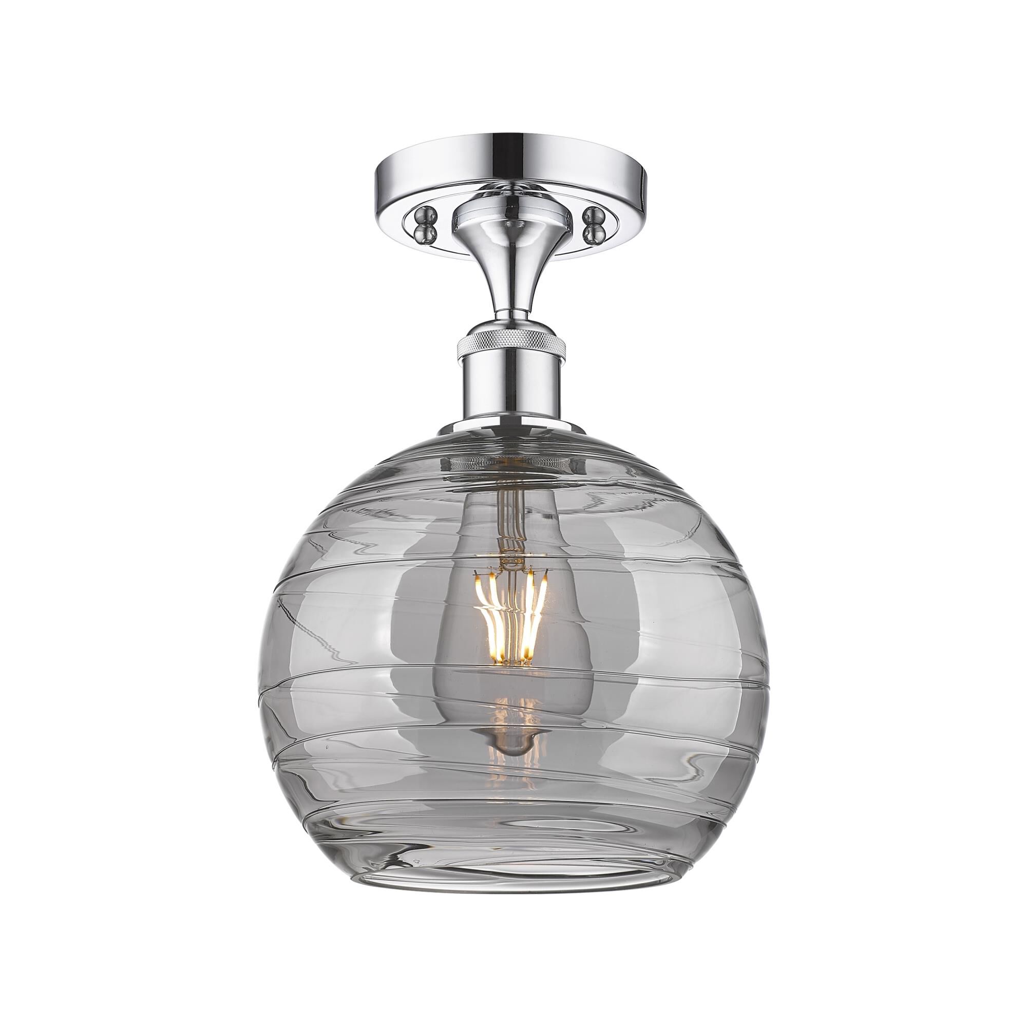 Shown in Polished Chrome finish and Light Smoke Deco Swirl glass