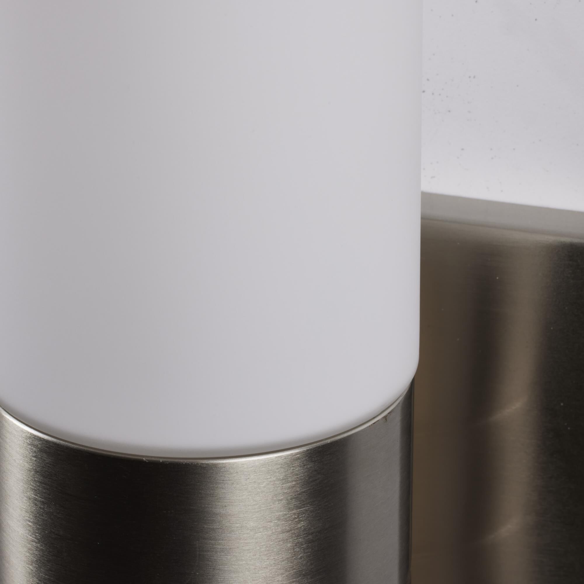 Shown in Brushed Nickel finish and White glass