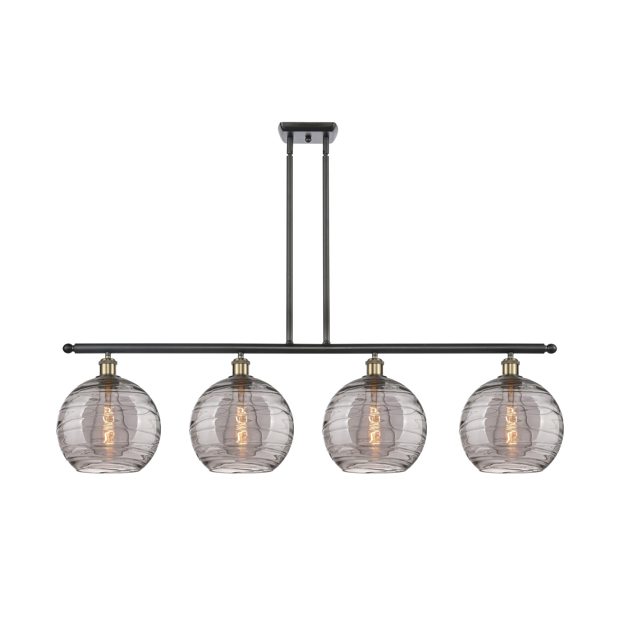 Shown in Black Antique Brass finish and Light Smoke Deco Swirl glass