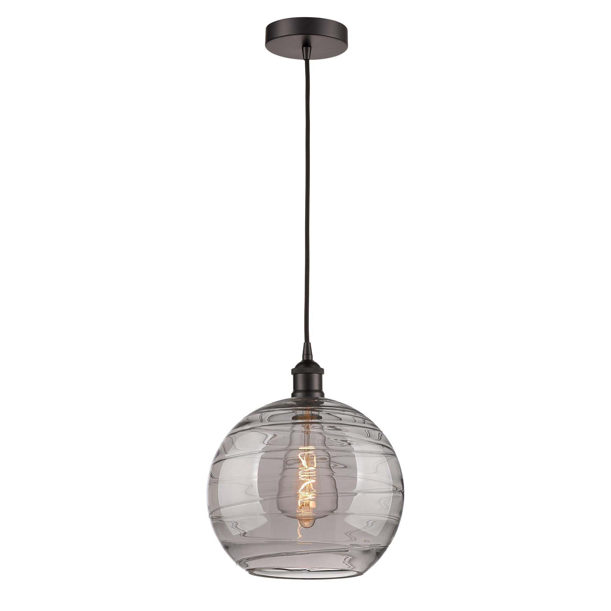 Shown in Oil Rubbed Bronze finish and Light Smoke Deco Swirl glass