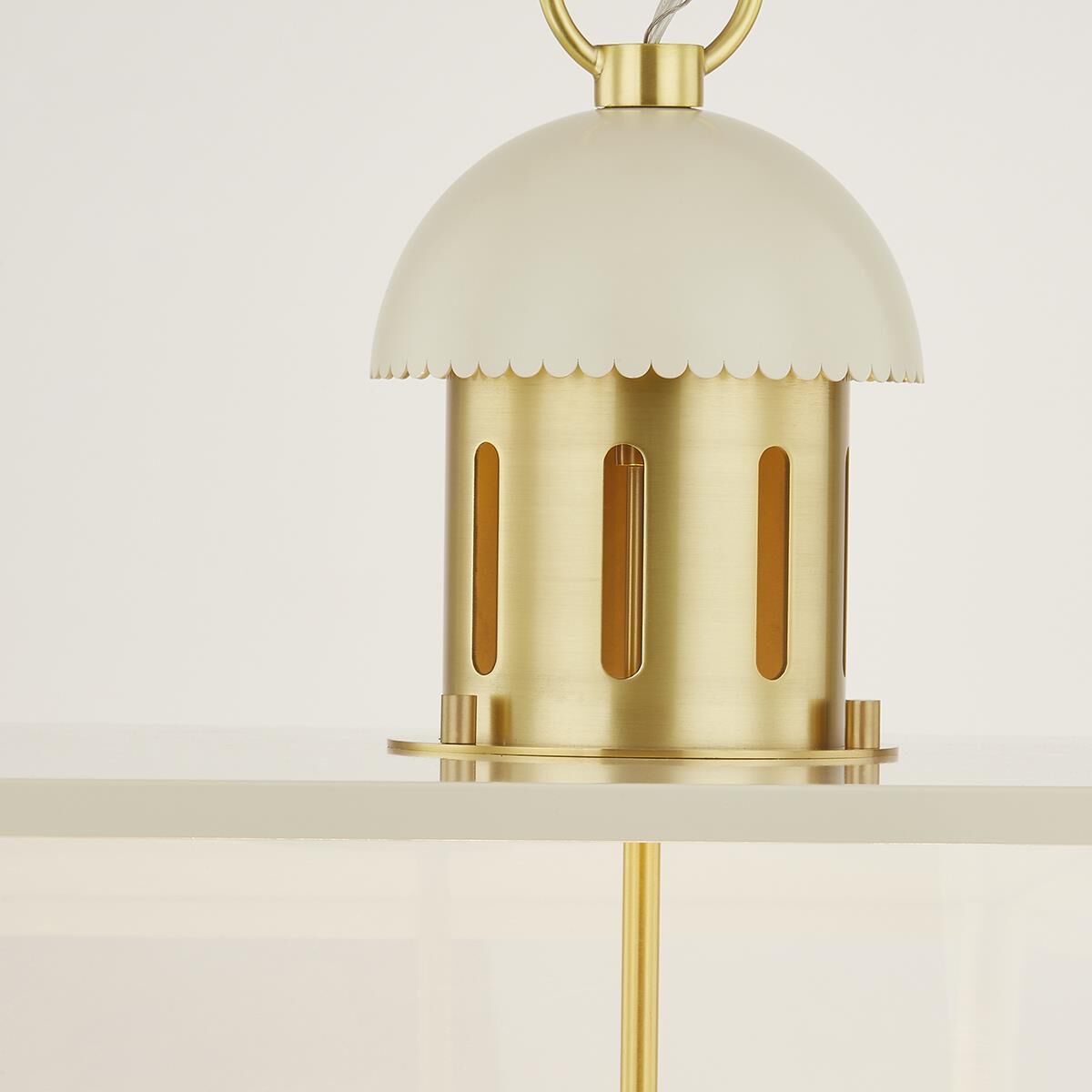 Shown in Aged Brass and Soft Cream finish and Clear glass