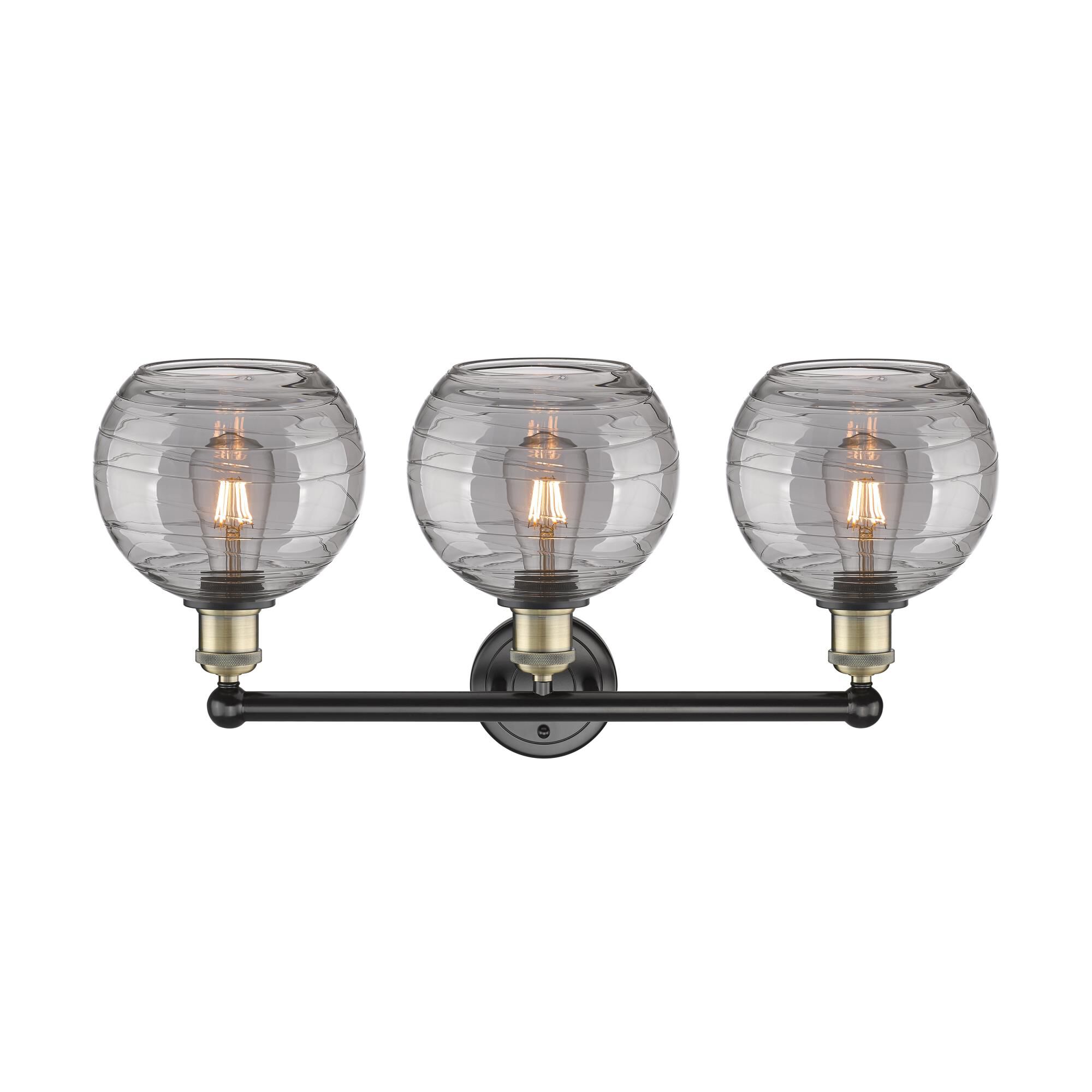 Shown in Black Antique Brass finish and Light Smoke Deco Swirl glass