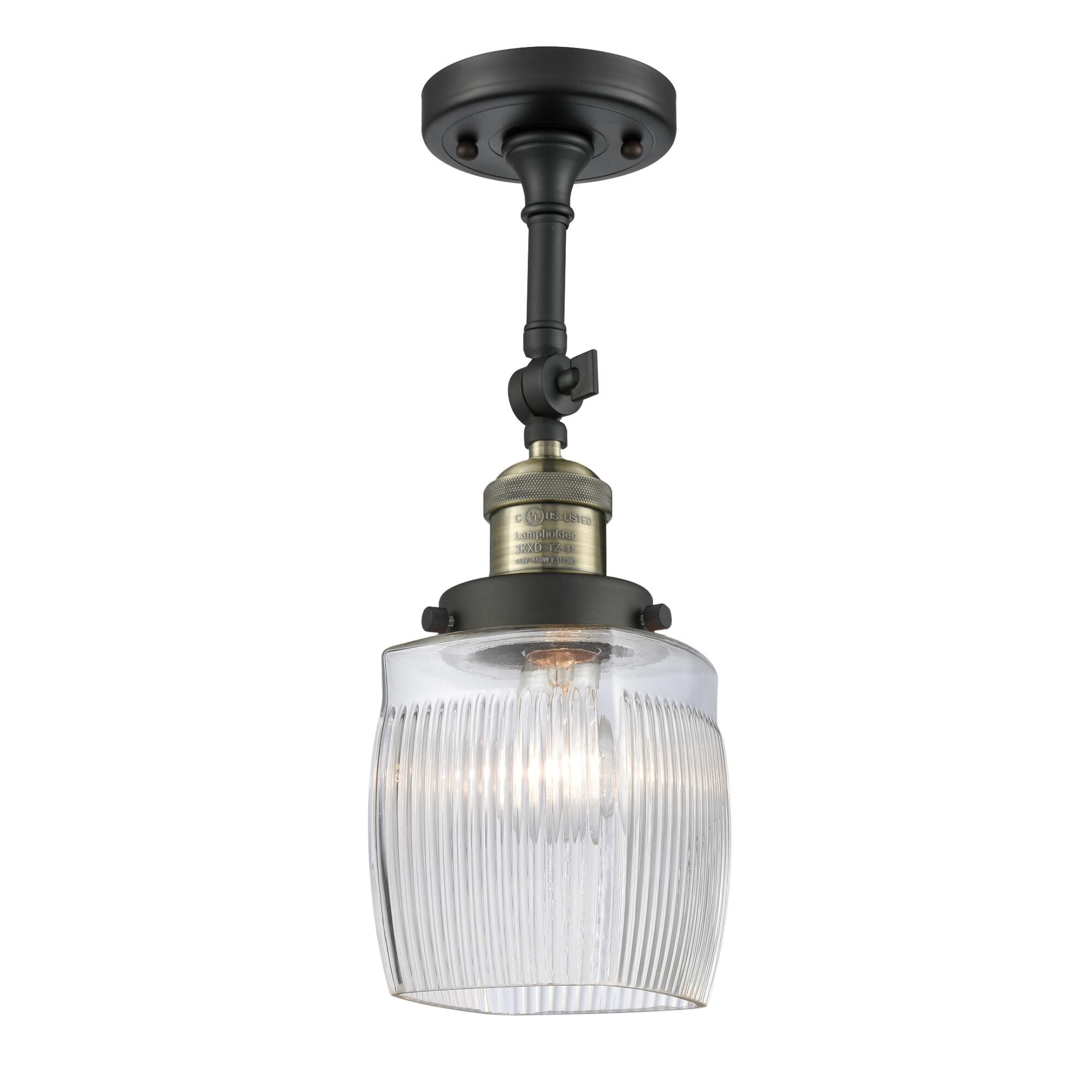 Shown in Black Antique Brass finish and Clear Halophane glass